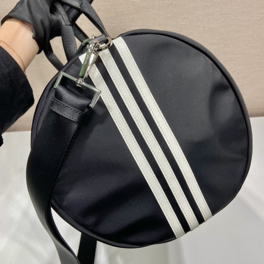 Pra*a nylon and saffiano leather duffle bag