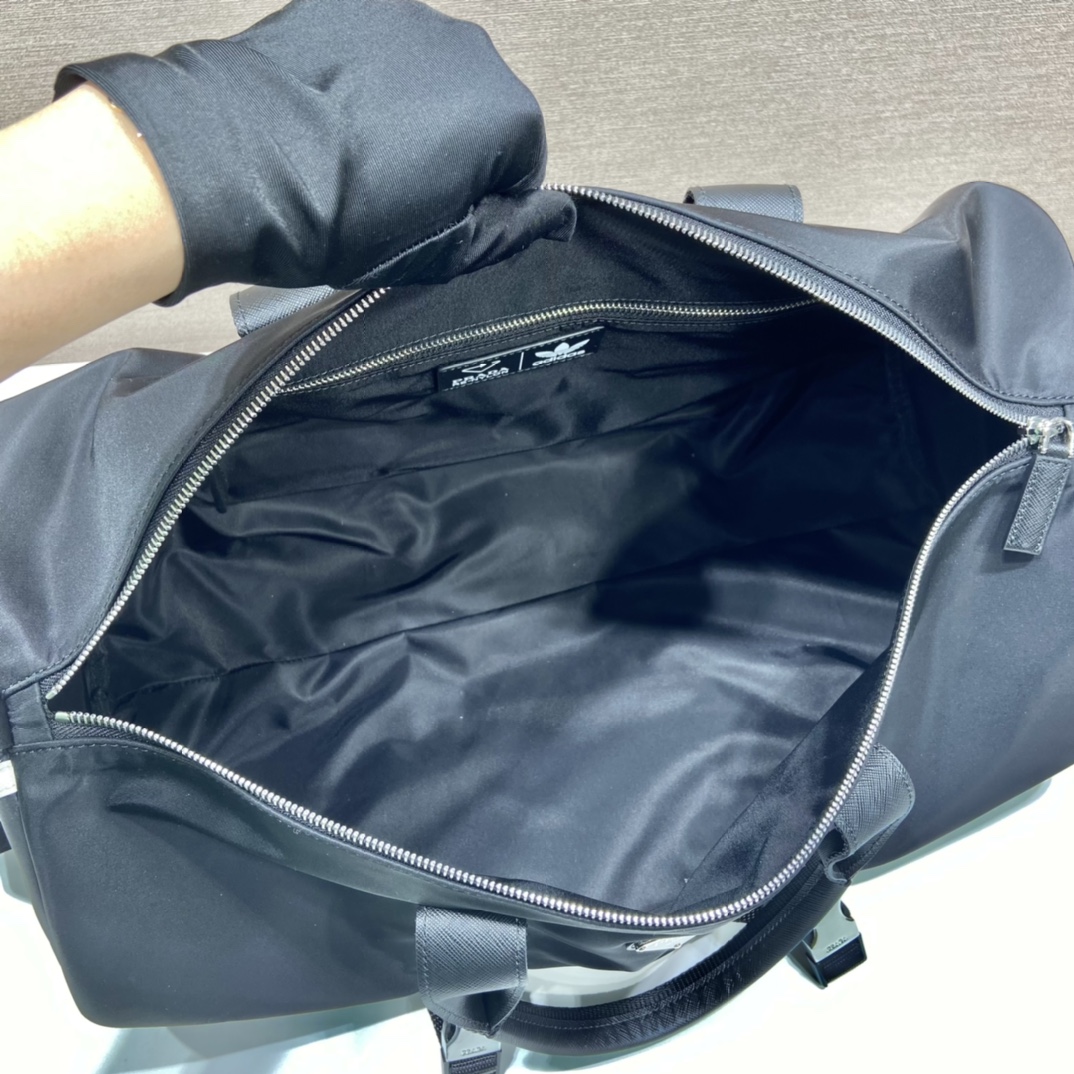 Pra*a nylon and saffiano leather duffle bag
