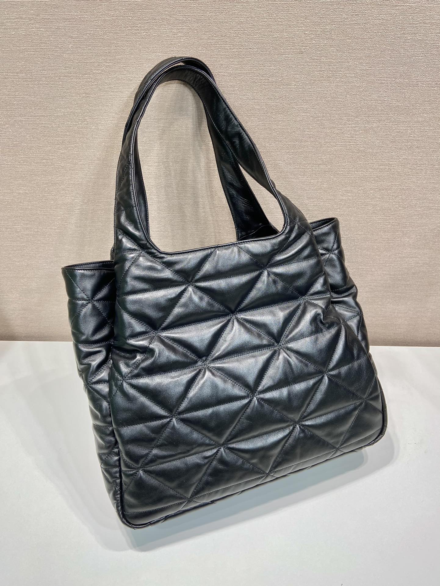 Pra*a large padded leather tote bag