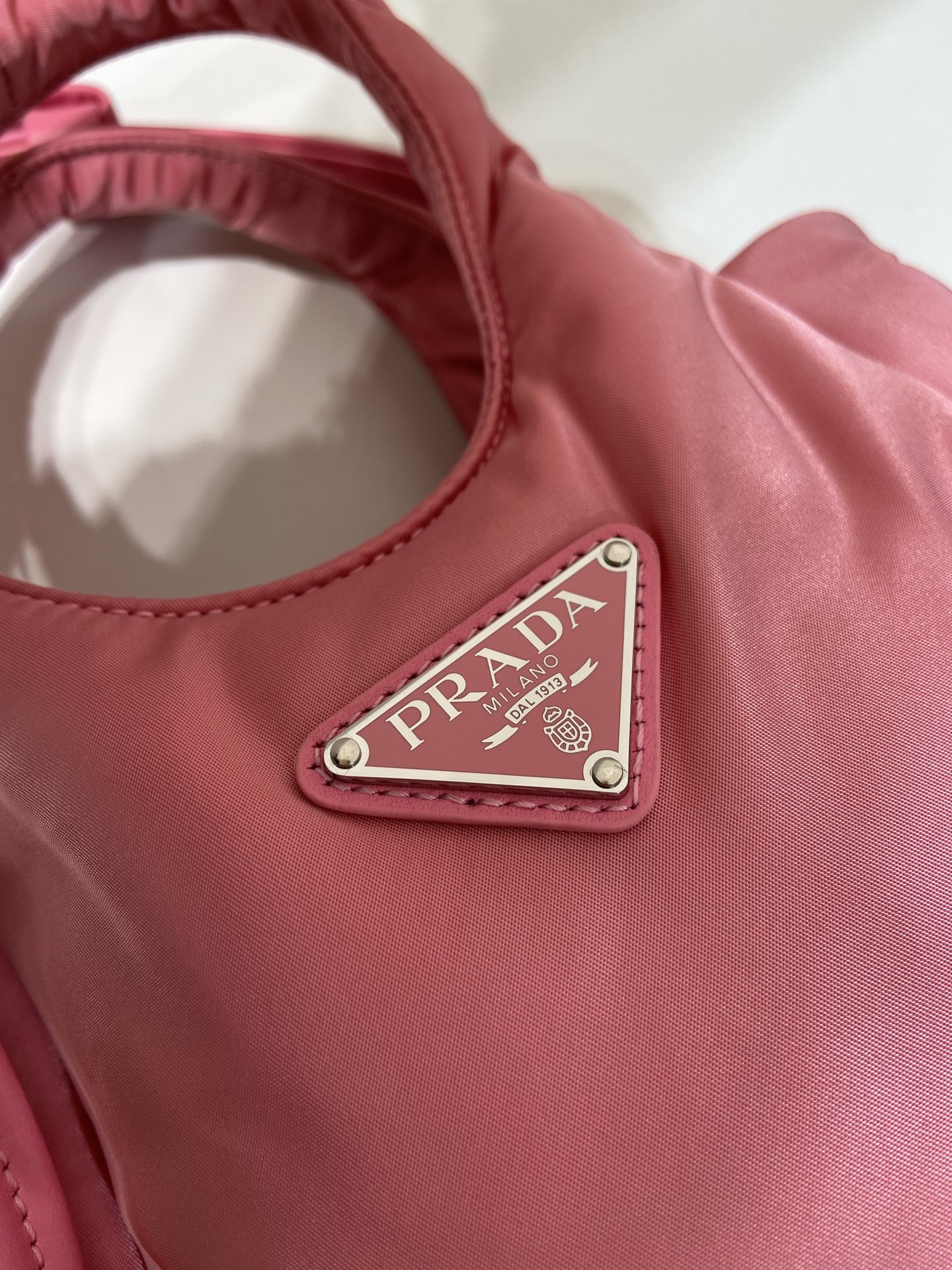 Pra*a soft padded re-nylon mini-bag