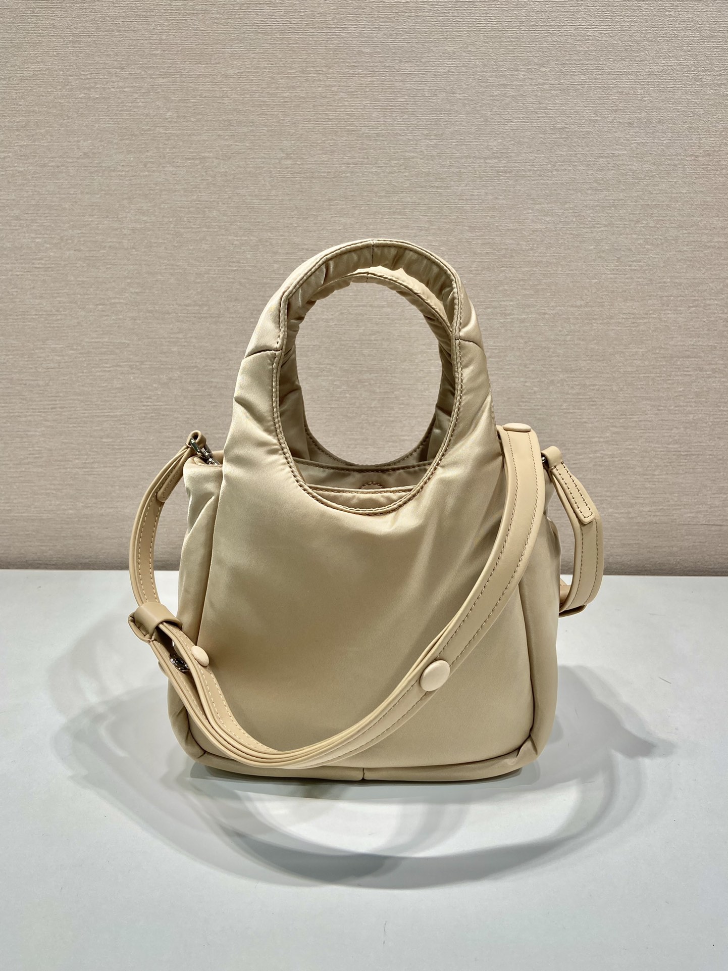 Pra*a soft padded re-nylon mini-bag