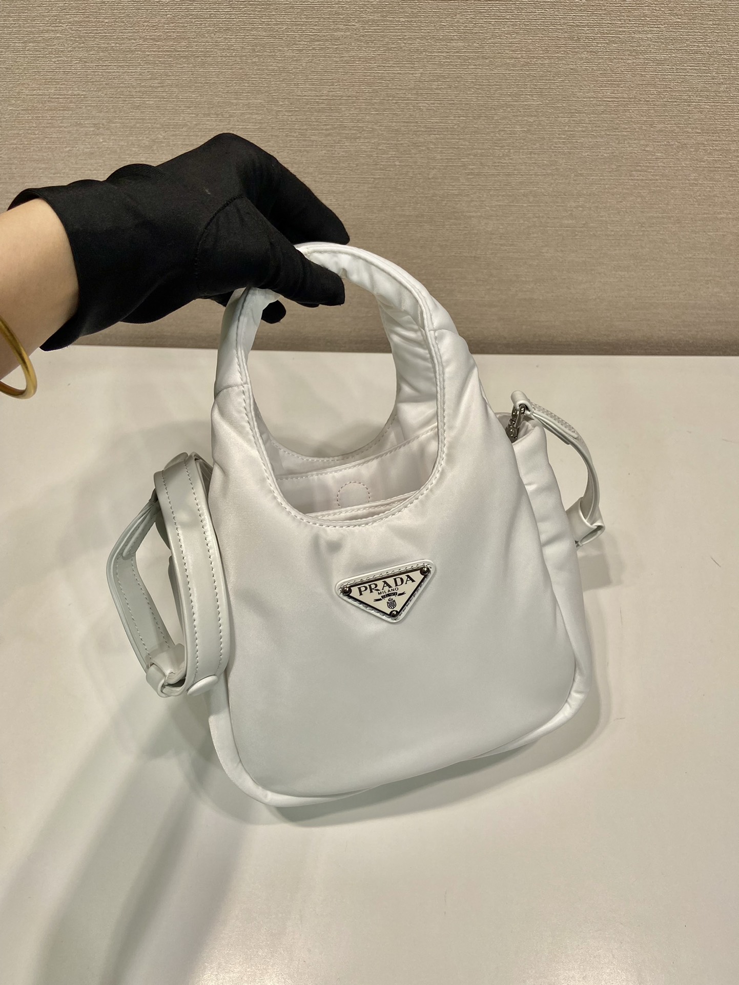 Pra*a soft padded re-nylon mini-bag