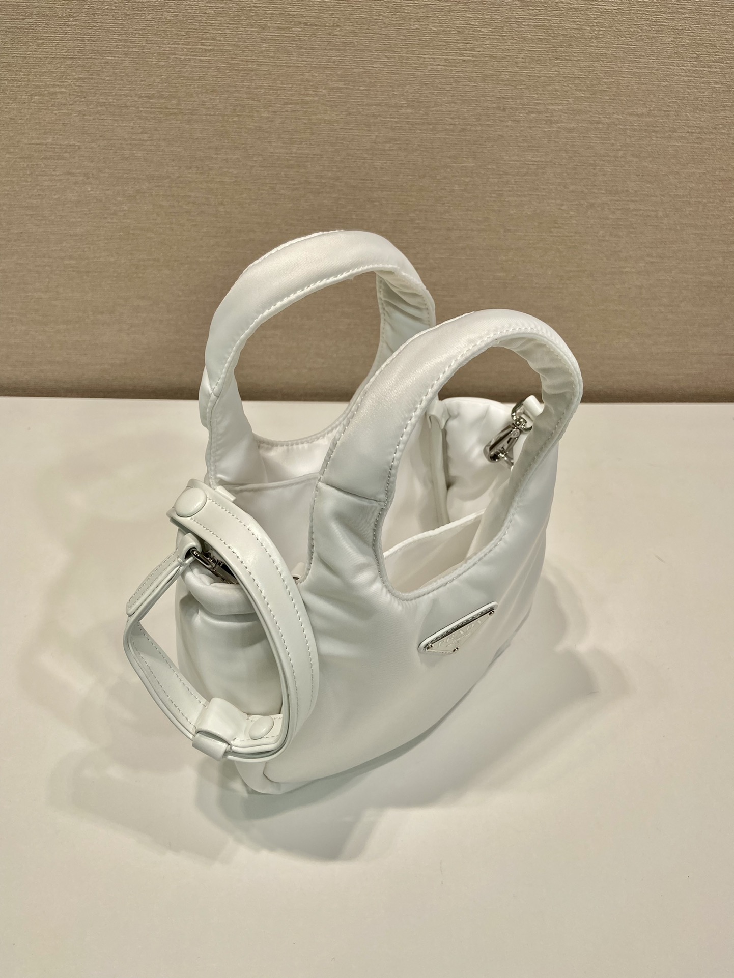 Pra*a soft padded re-nylon mini-bag