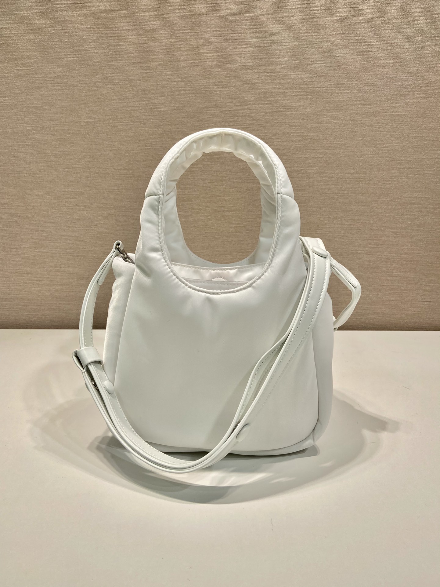 Pra*a soft padded re-nylon mini-bag