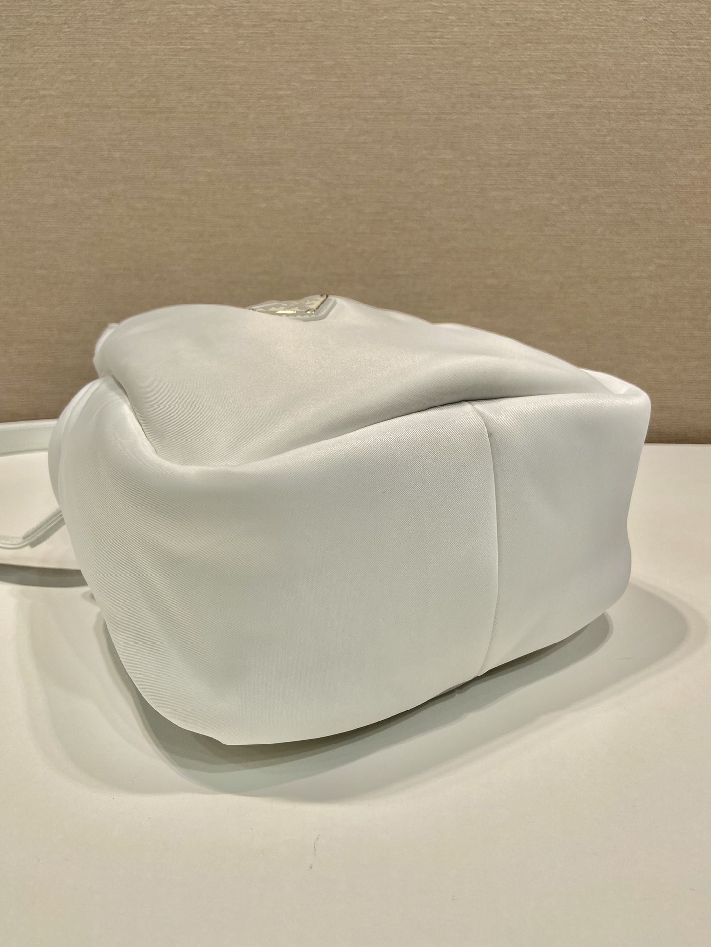 Pra*a soft padded re-nylon mini-bag