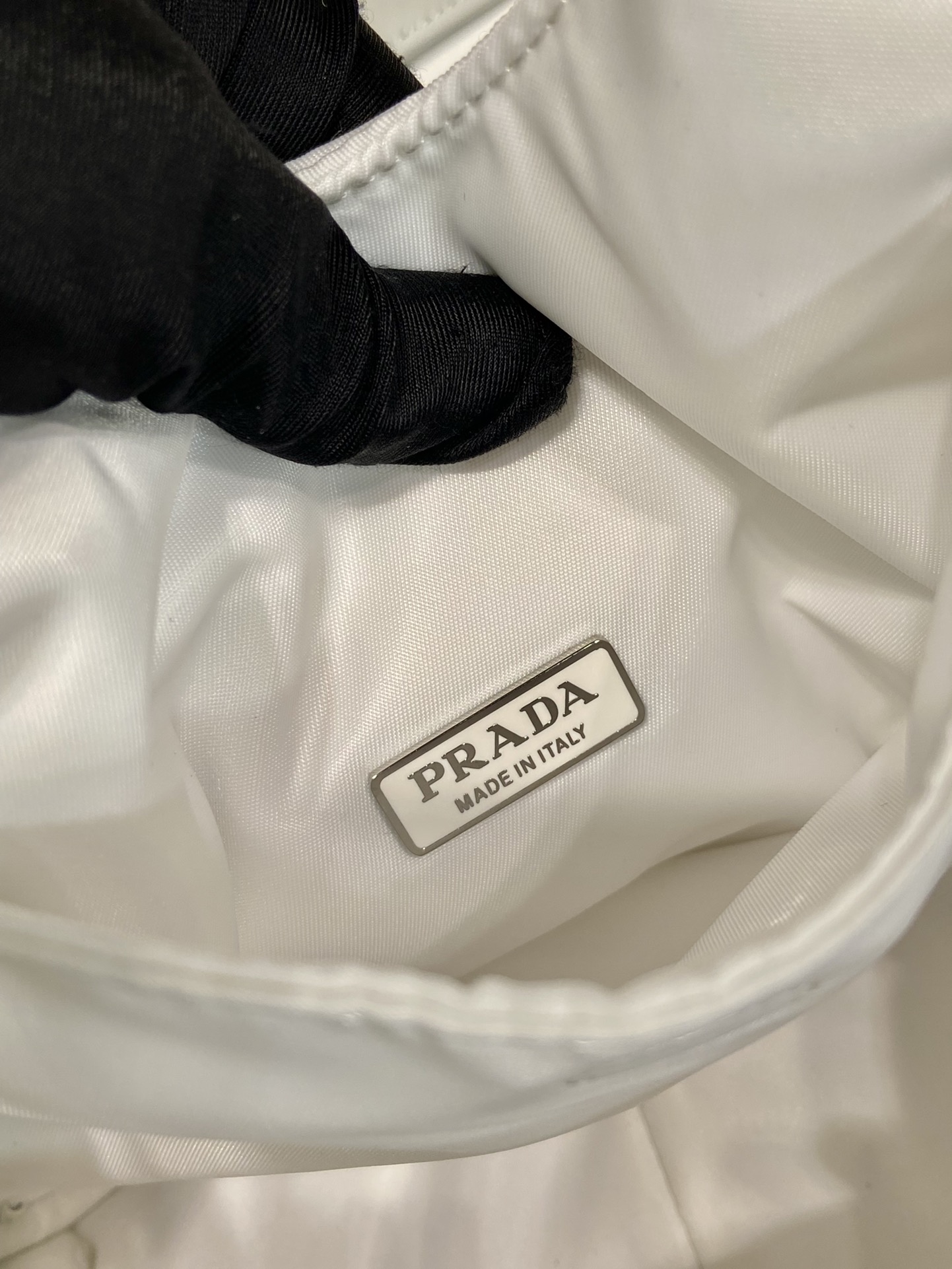 Pra*a soft padded re-nylon mini-bag