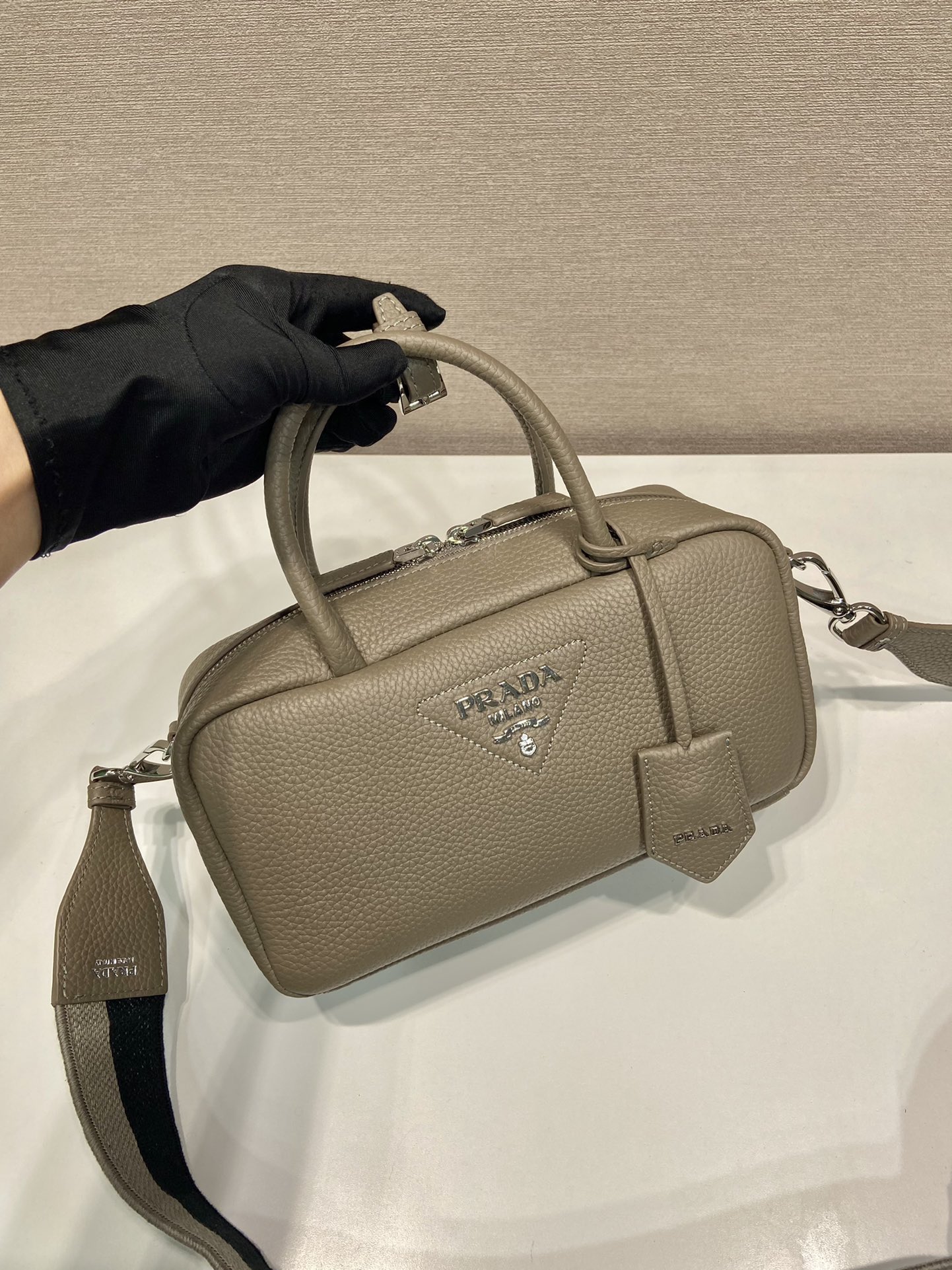 Pra*a leather top-handle bag