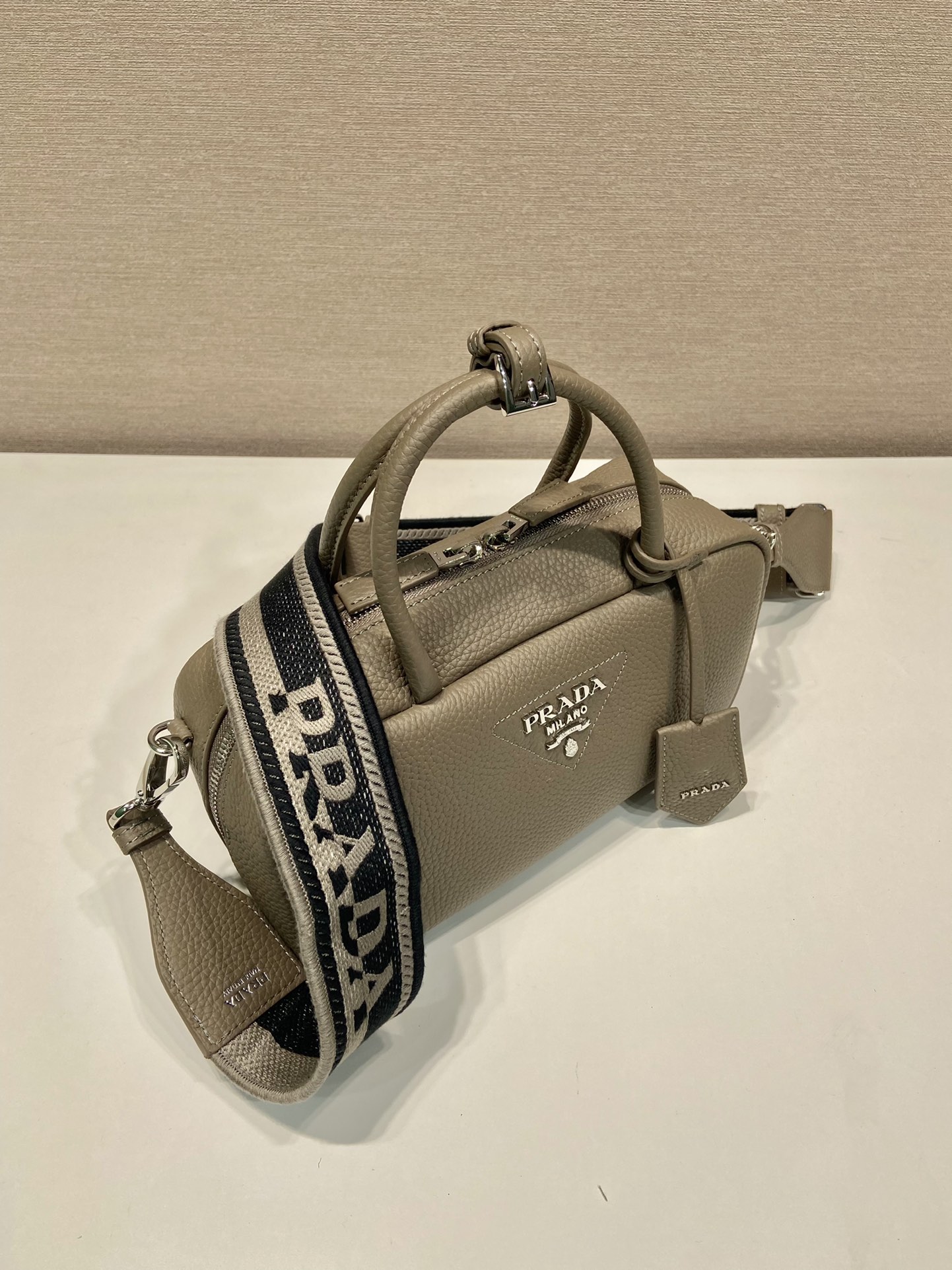 Pra*a leather top-handle bag