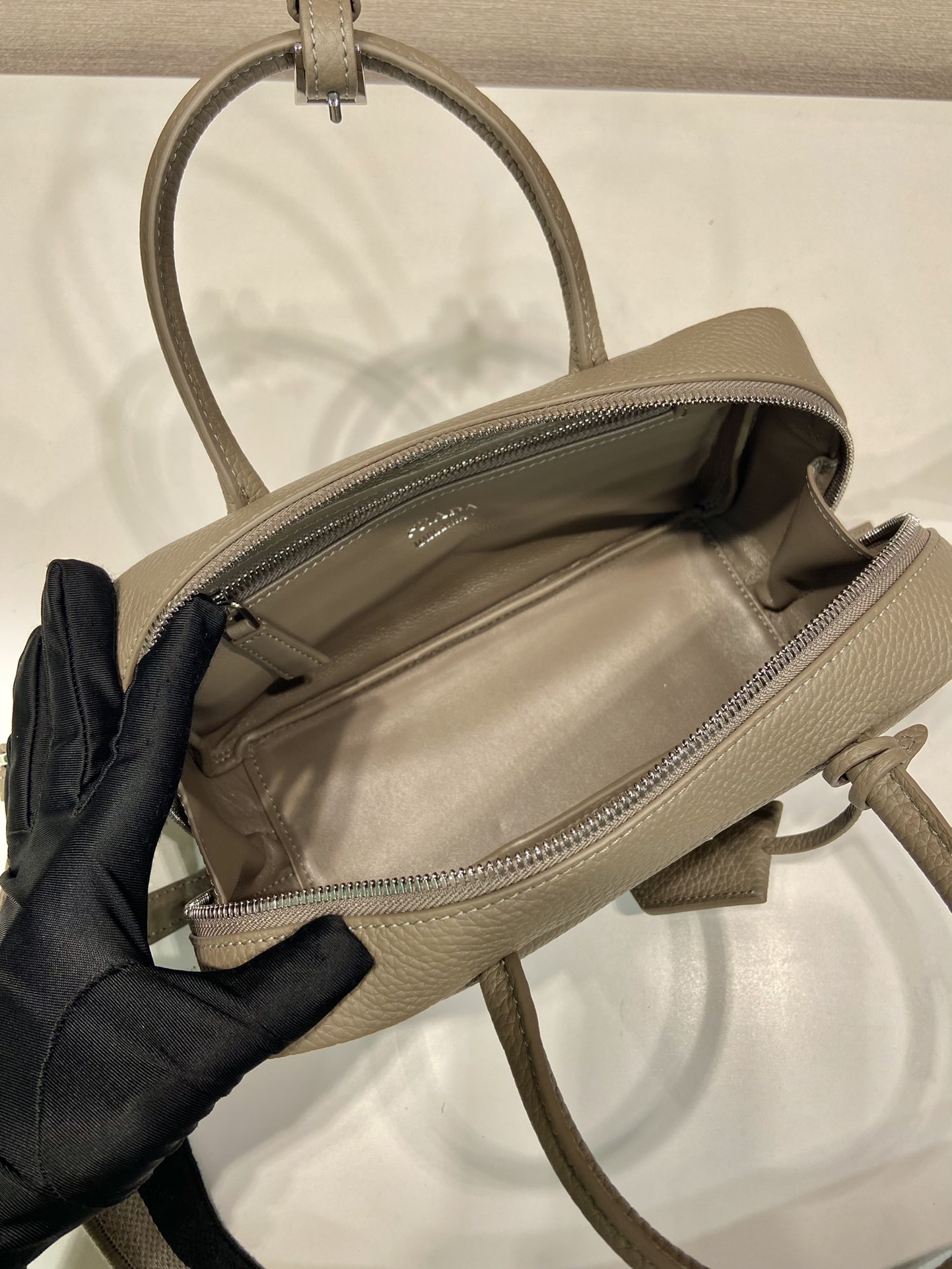 Pra*a leather top-handle bag