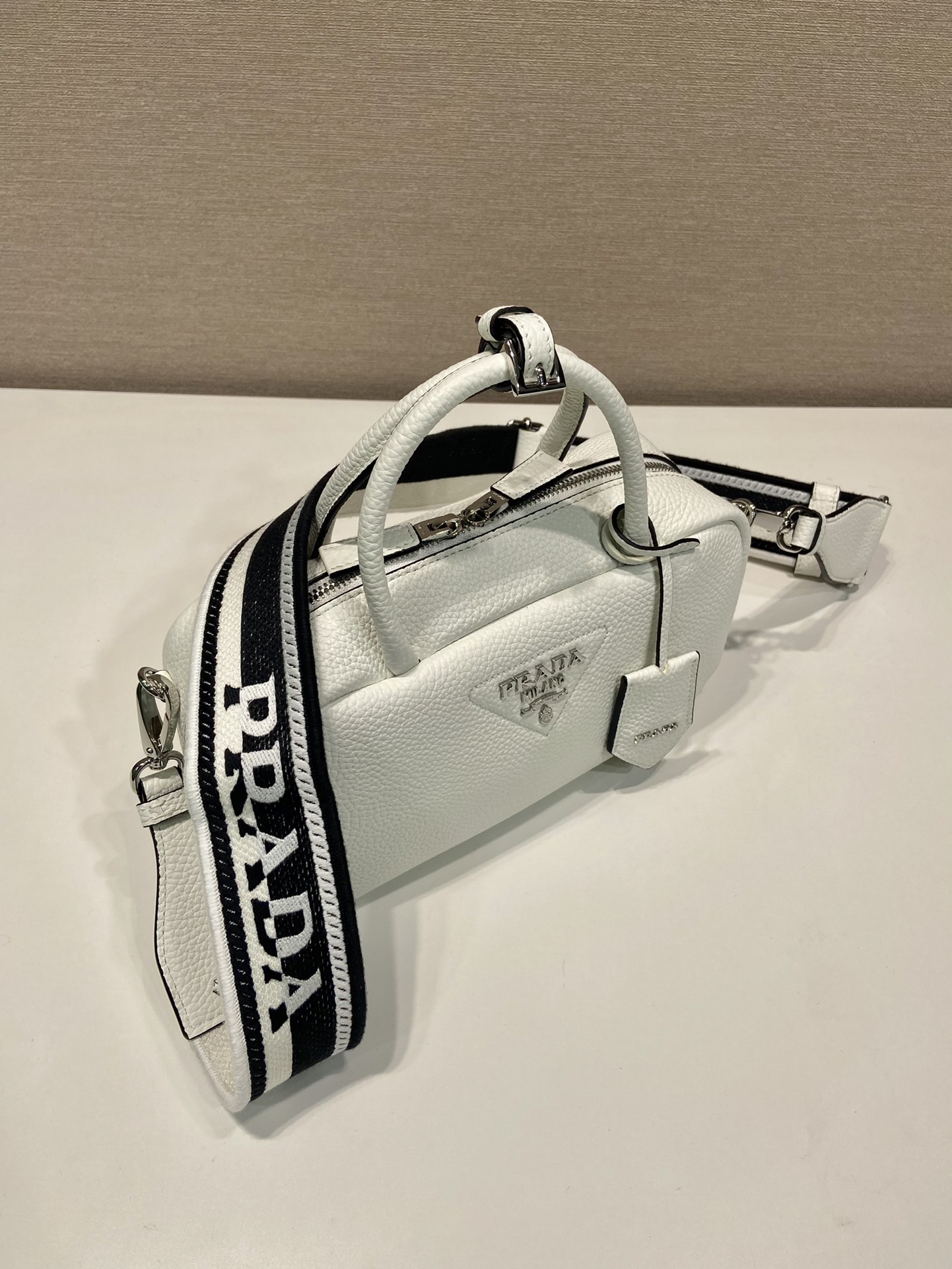 Pra*a leather top-handle bag