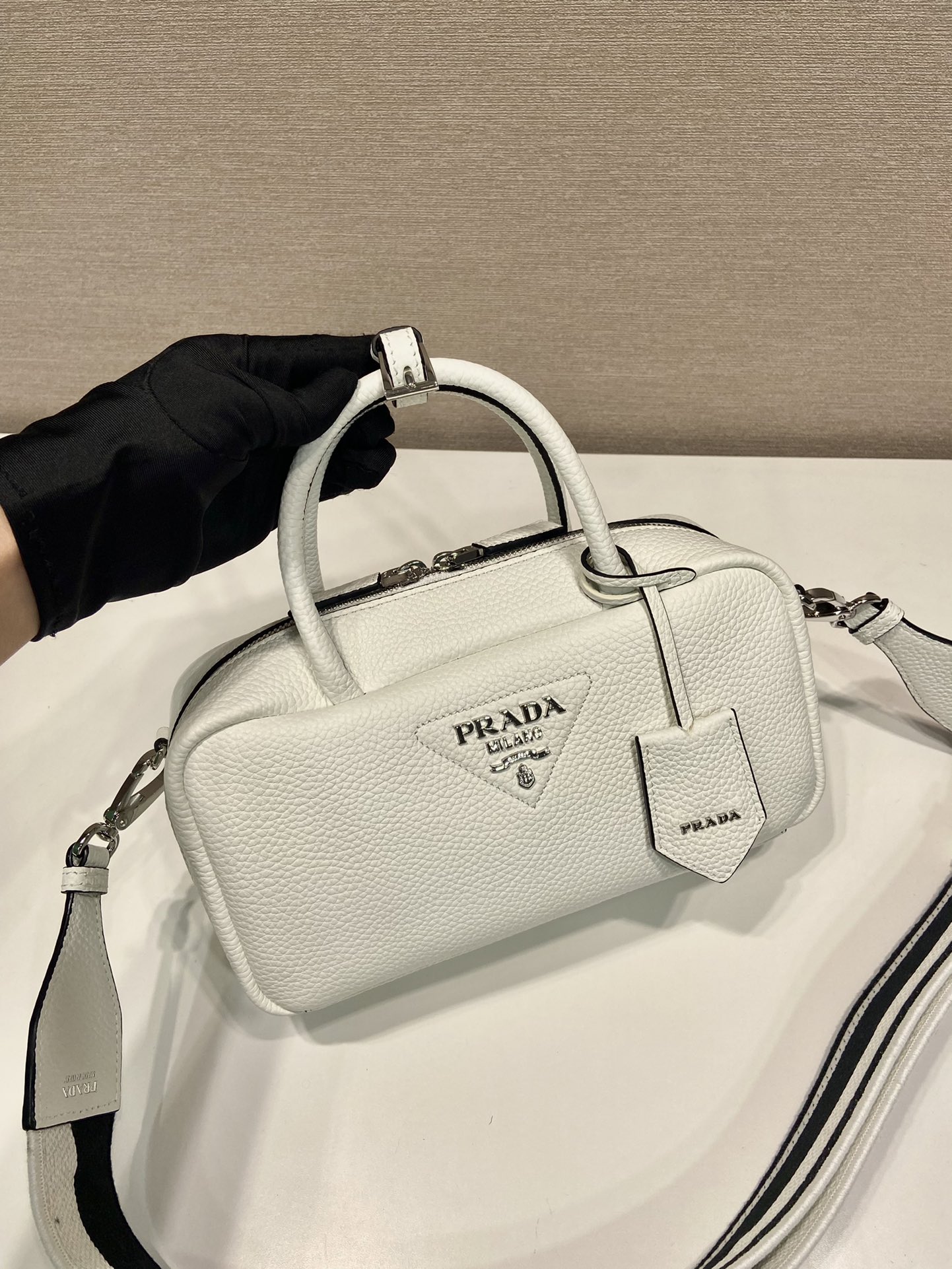 Pra*a leather top-handle bag