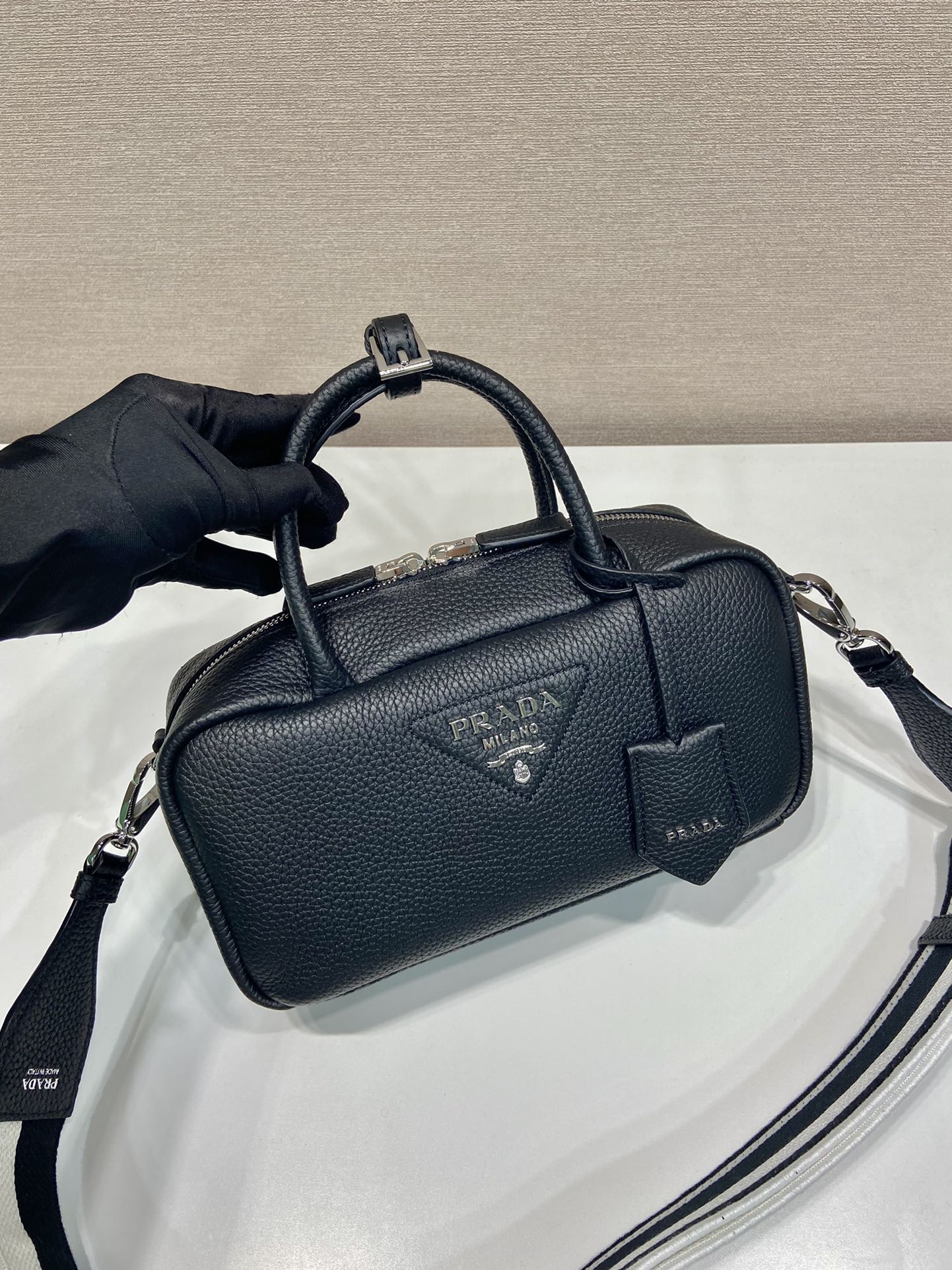 Pra*a leather top-handle bag