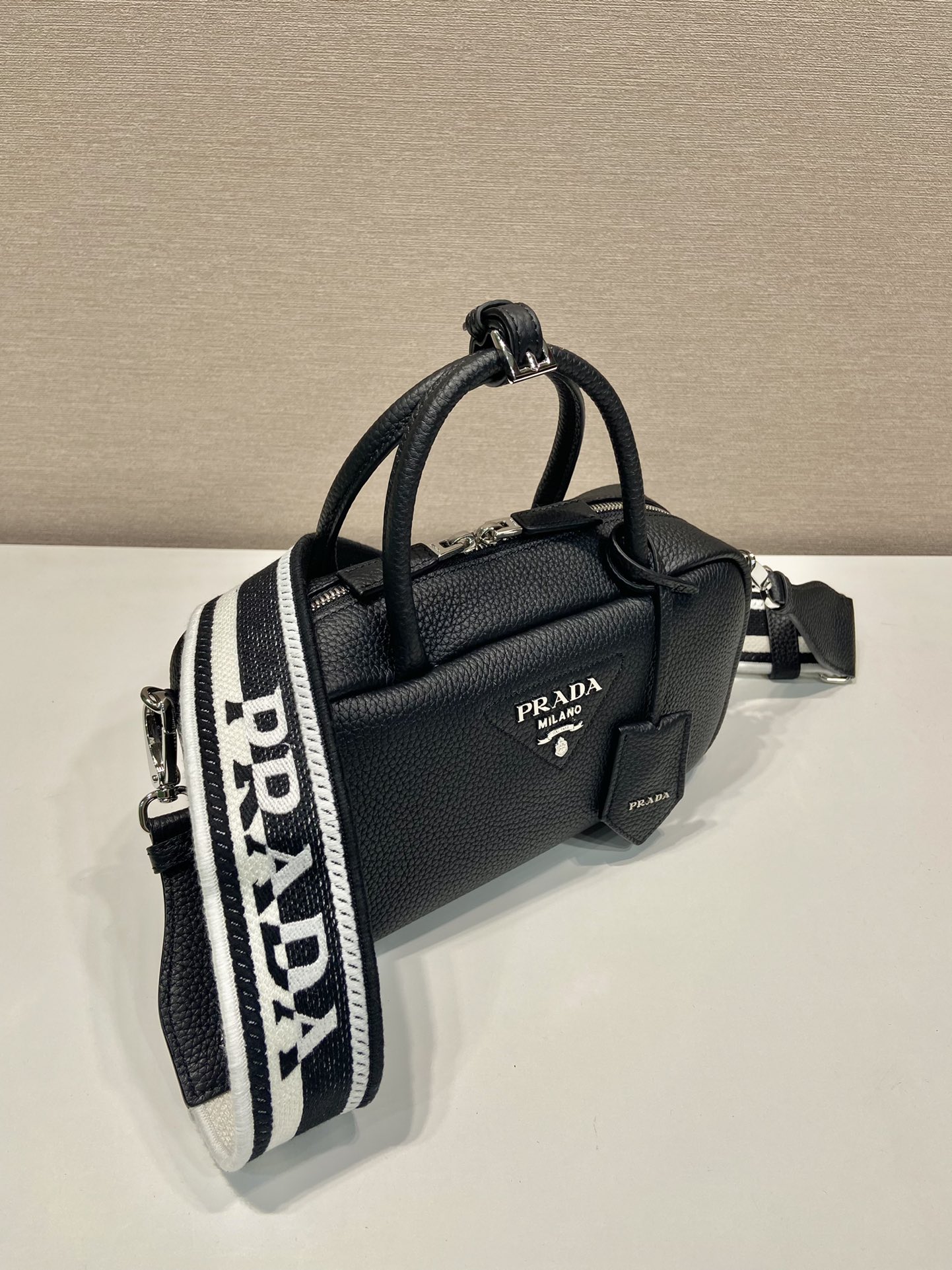 Pra*a leather top-handle bag