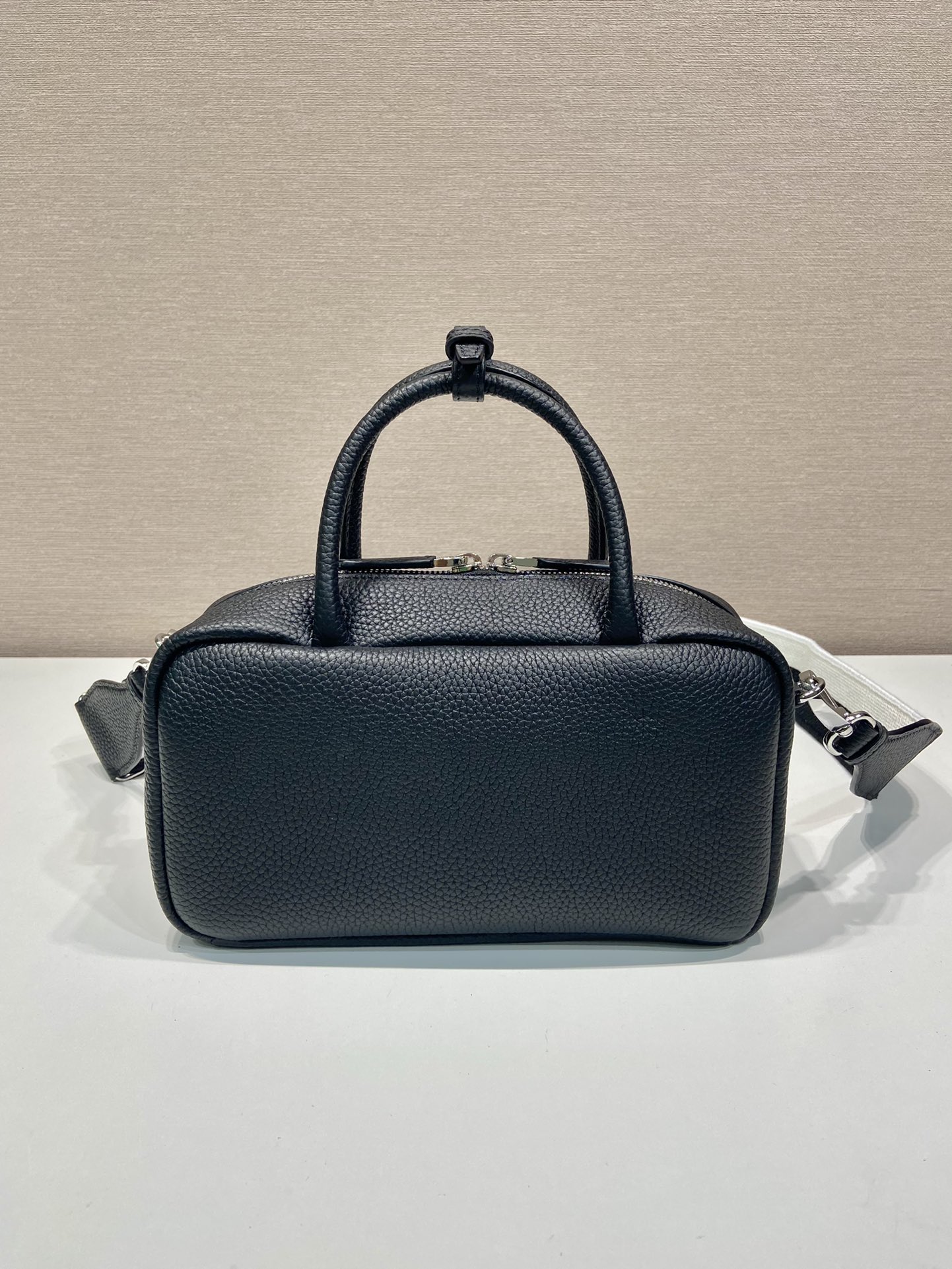 Pra*a leather top-handle bag