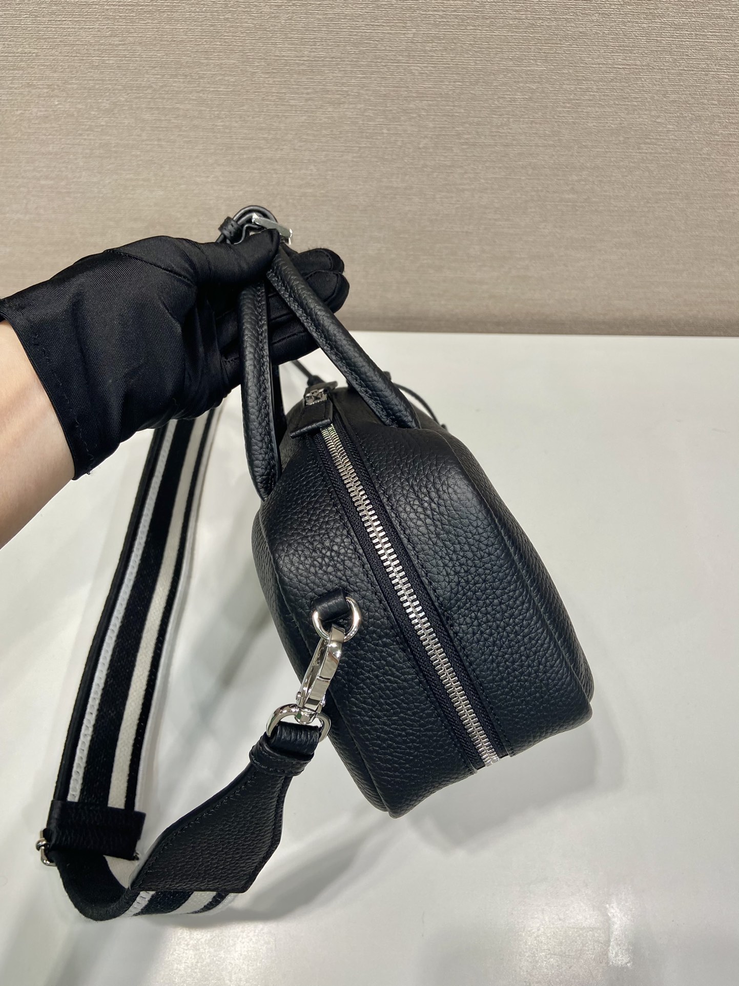 Pra*a leather top-handle bag