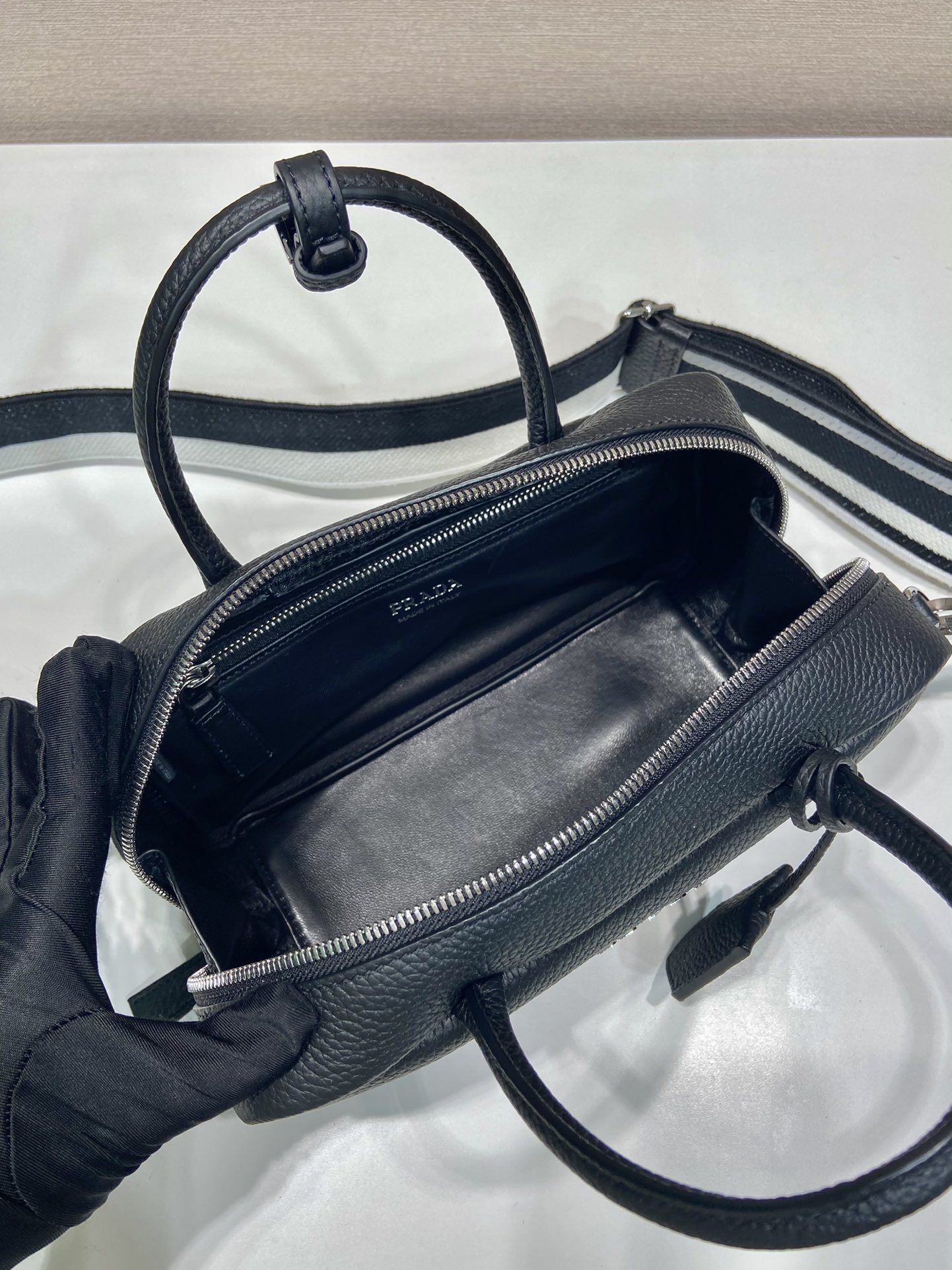 Pra*a leather top-handle bag