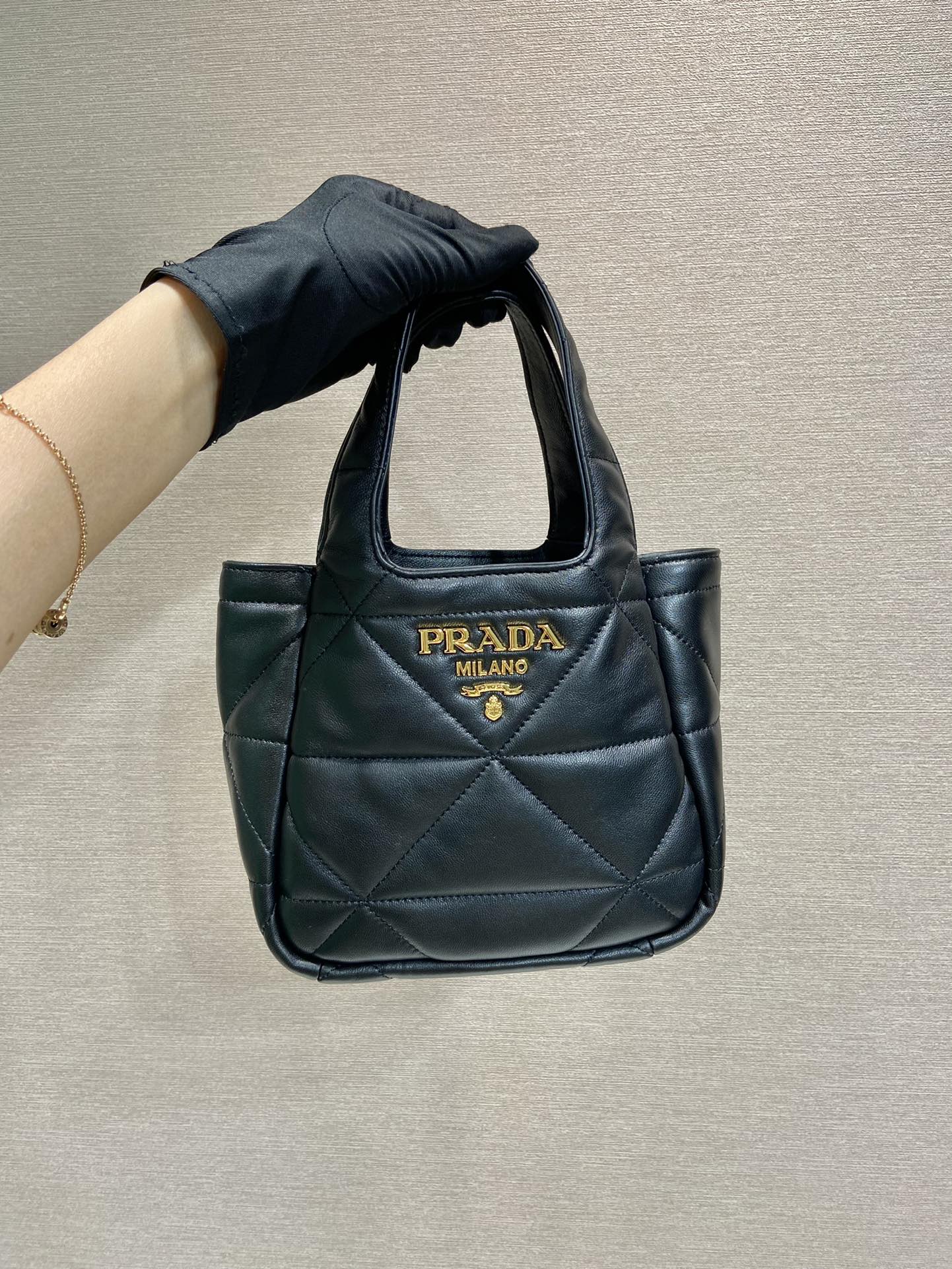 Pra*a small nappa-leather tote bag with topstitching