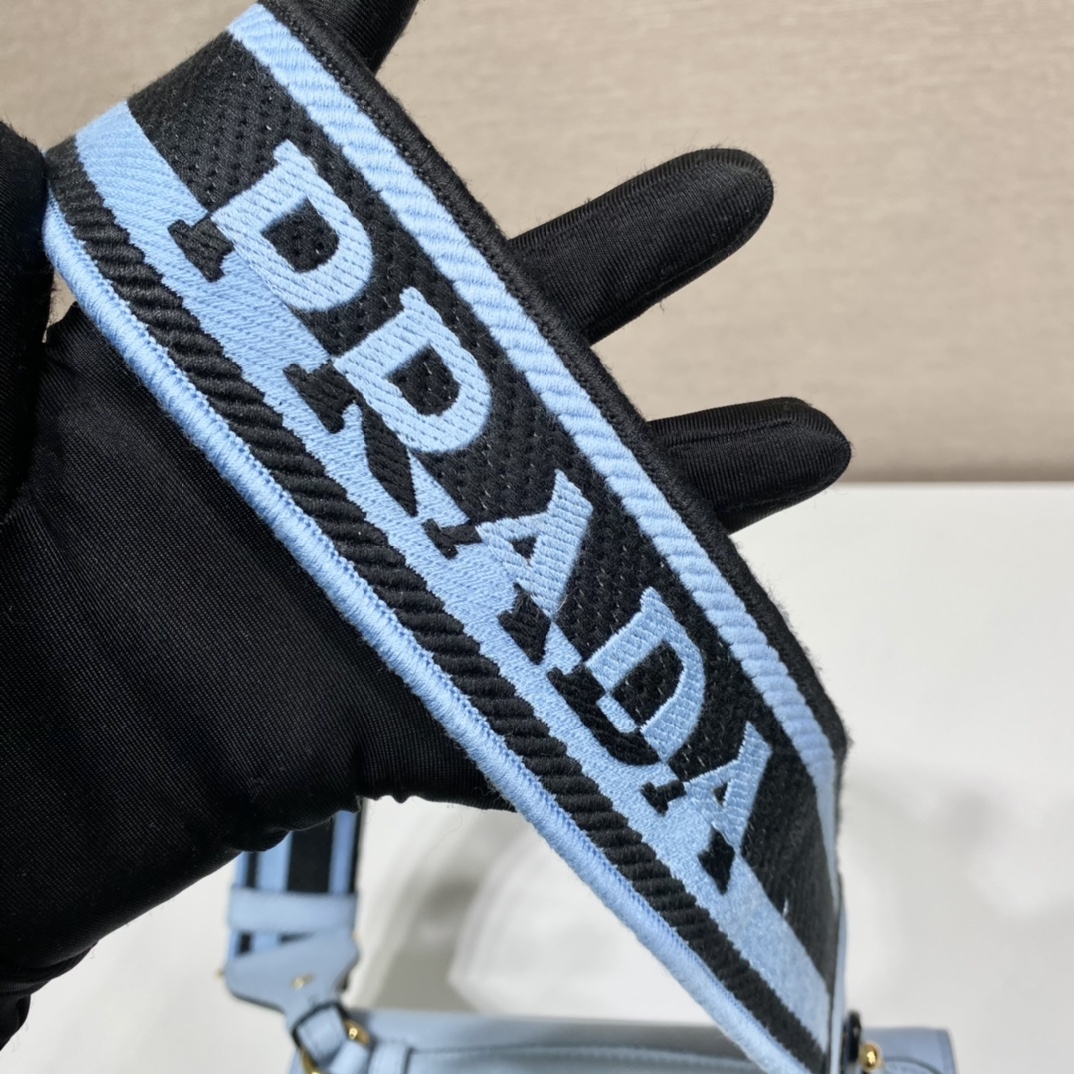 Pra*a monochrome saffiano and leather bag