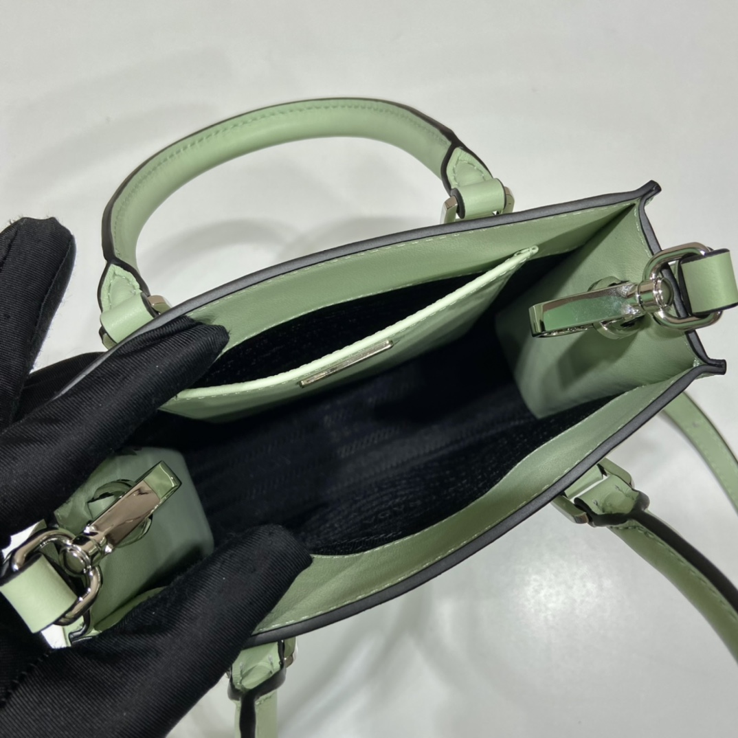 Pra*a small saffiano leather handbag