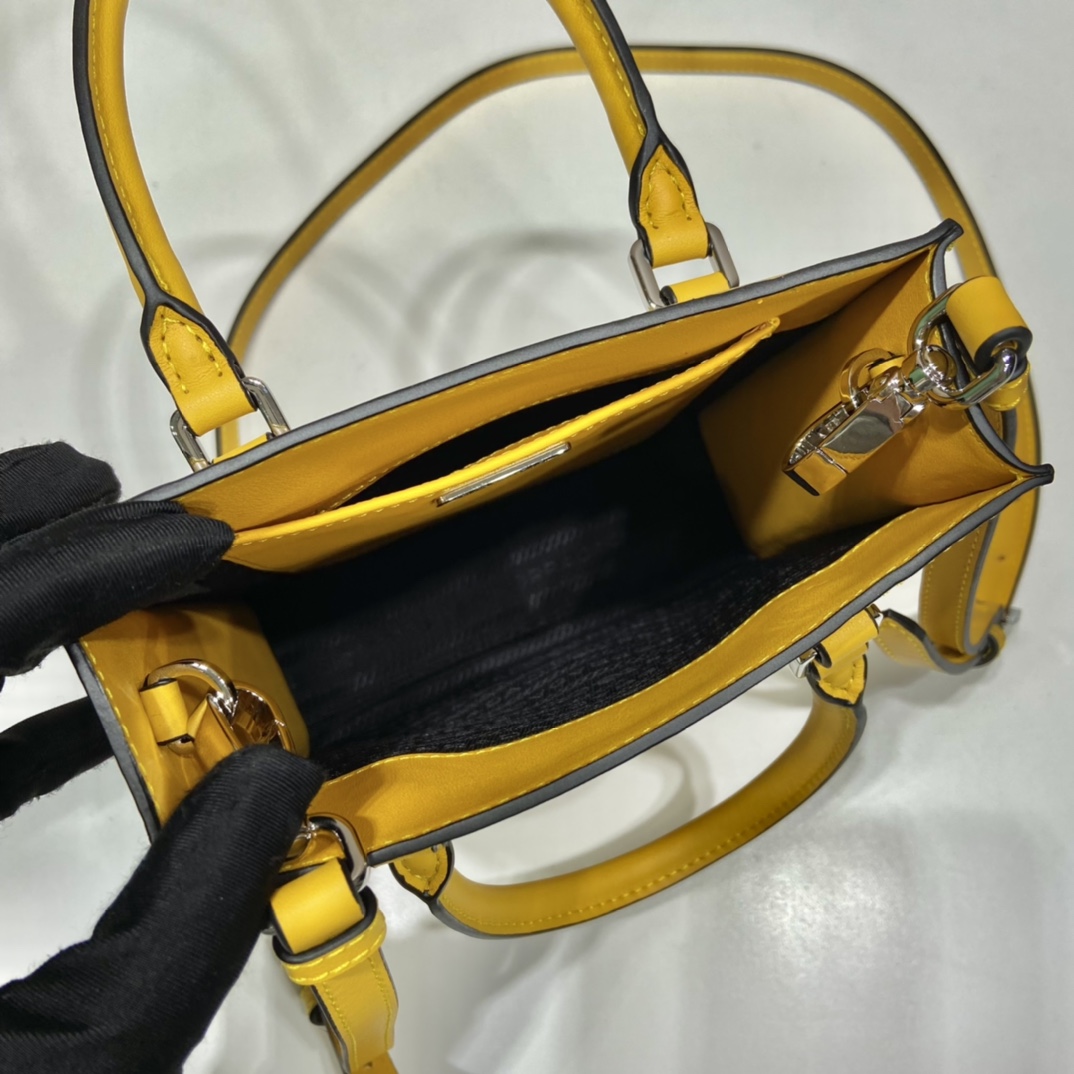 Pra*a small saffiano leather handbag