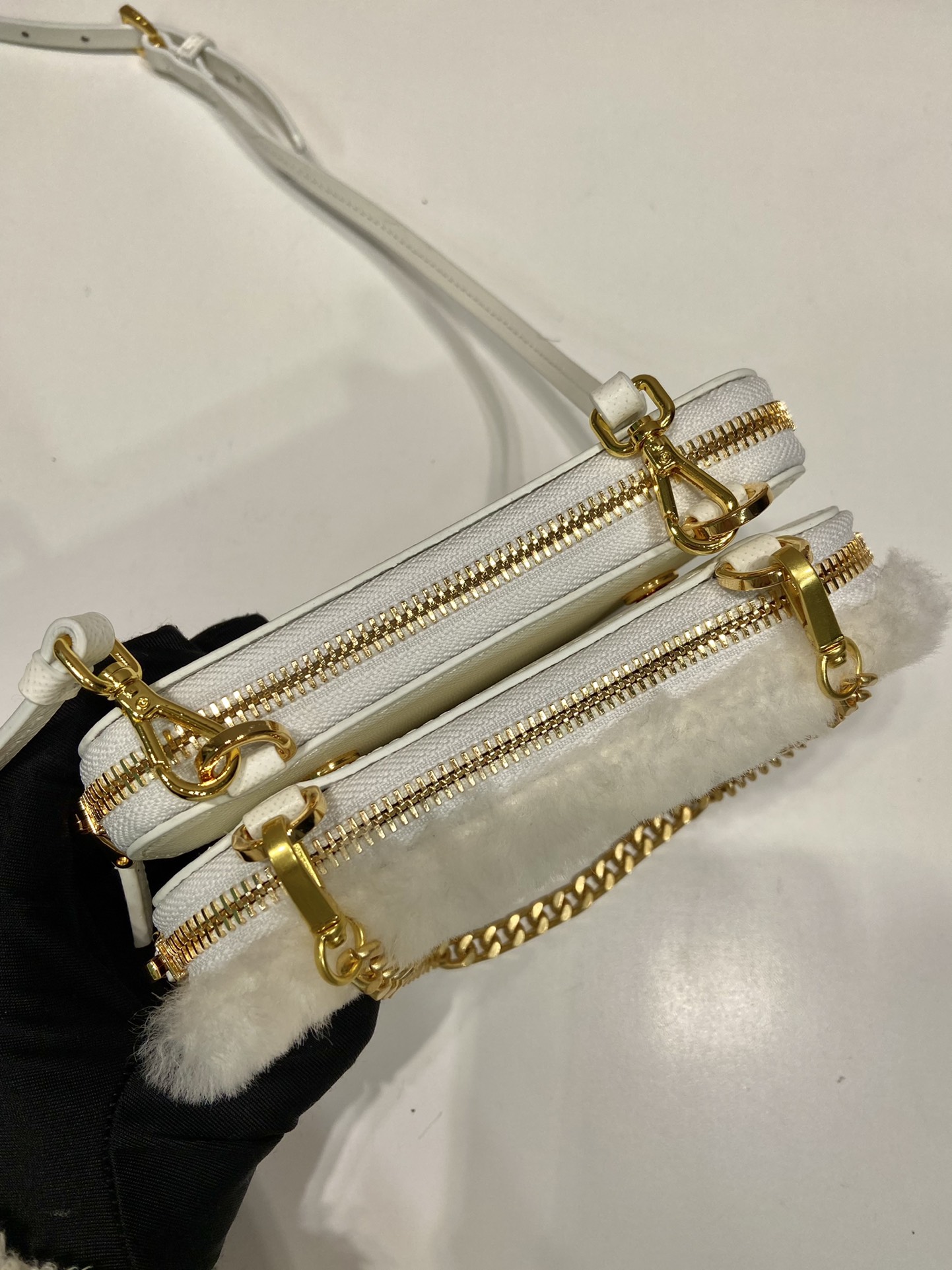 Pra*a shearling and saffiano leather mini-pouch