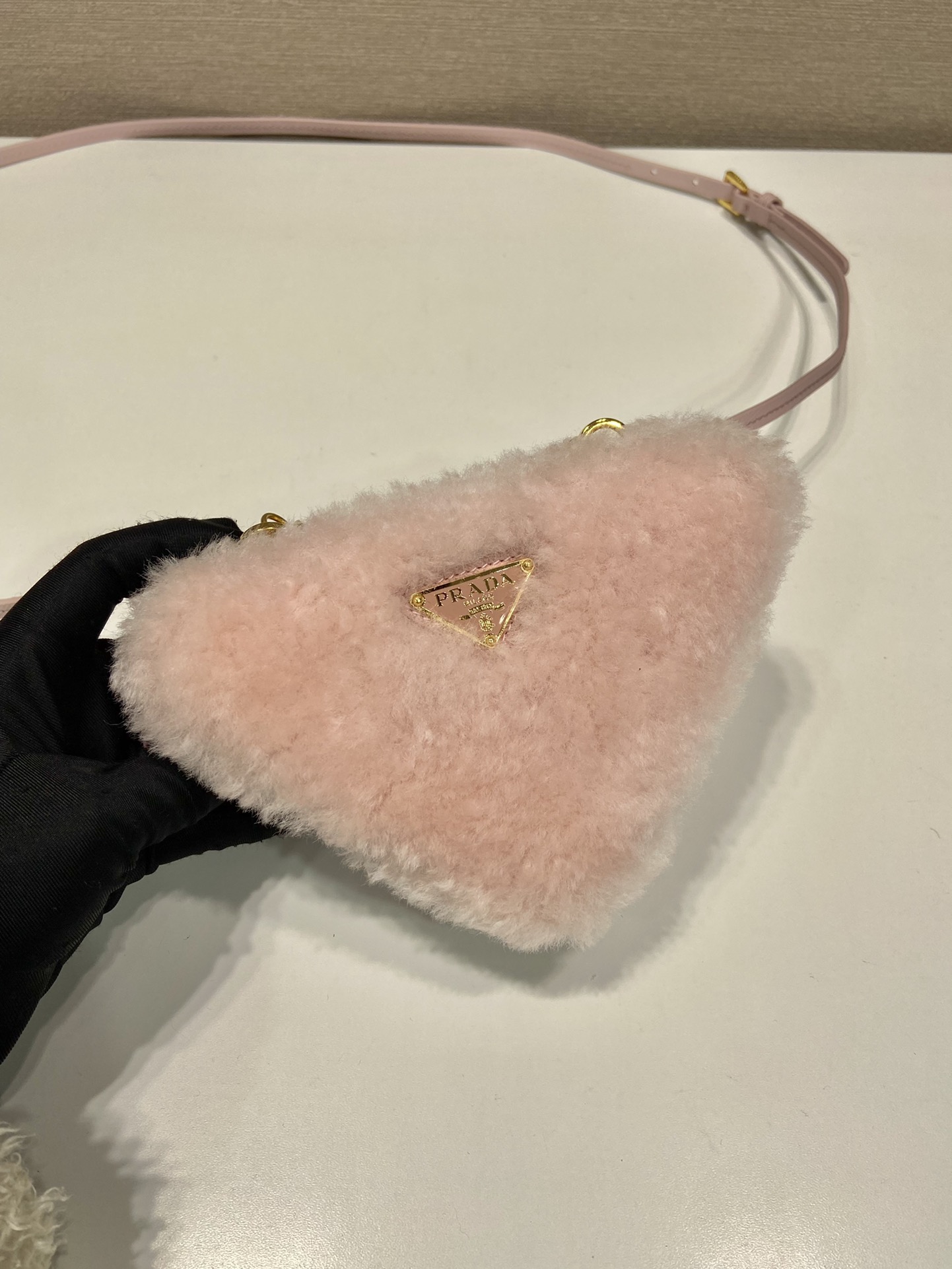 Pra*a shearling and saffiano leather mini-pouch