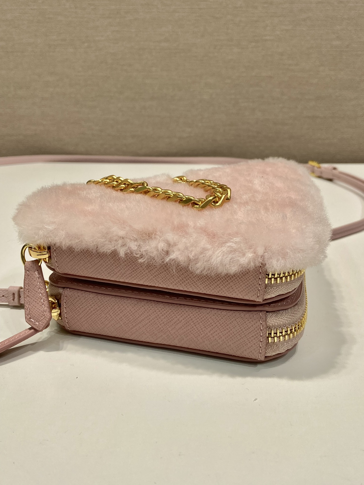 Pra*a shearling and saffiano leather mini-pouch