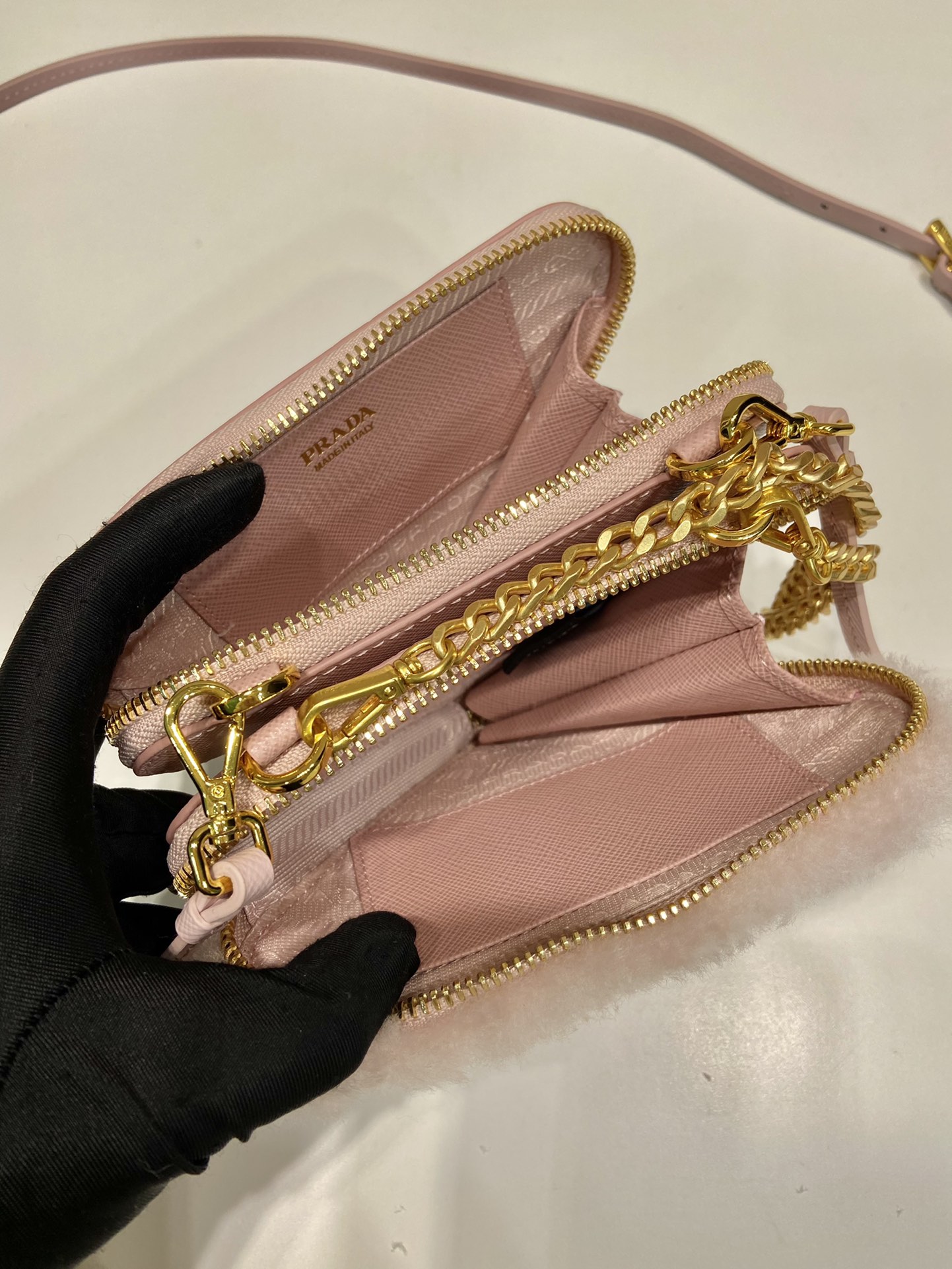 Pra*a shearling and saffiano leather mini-pouch