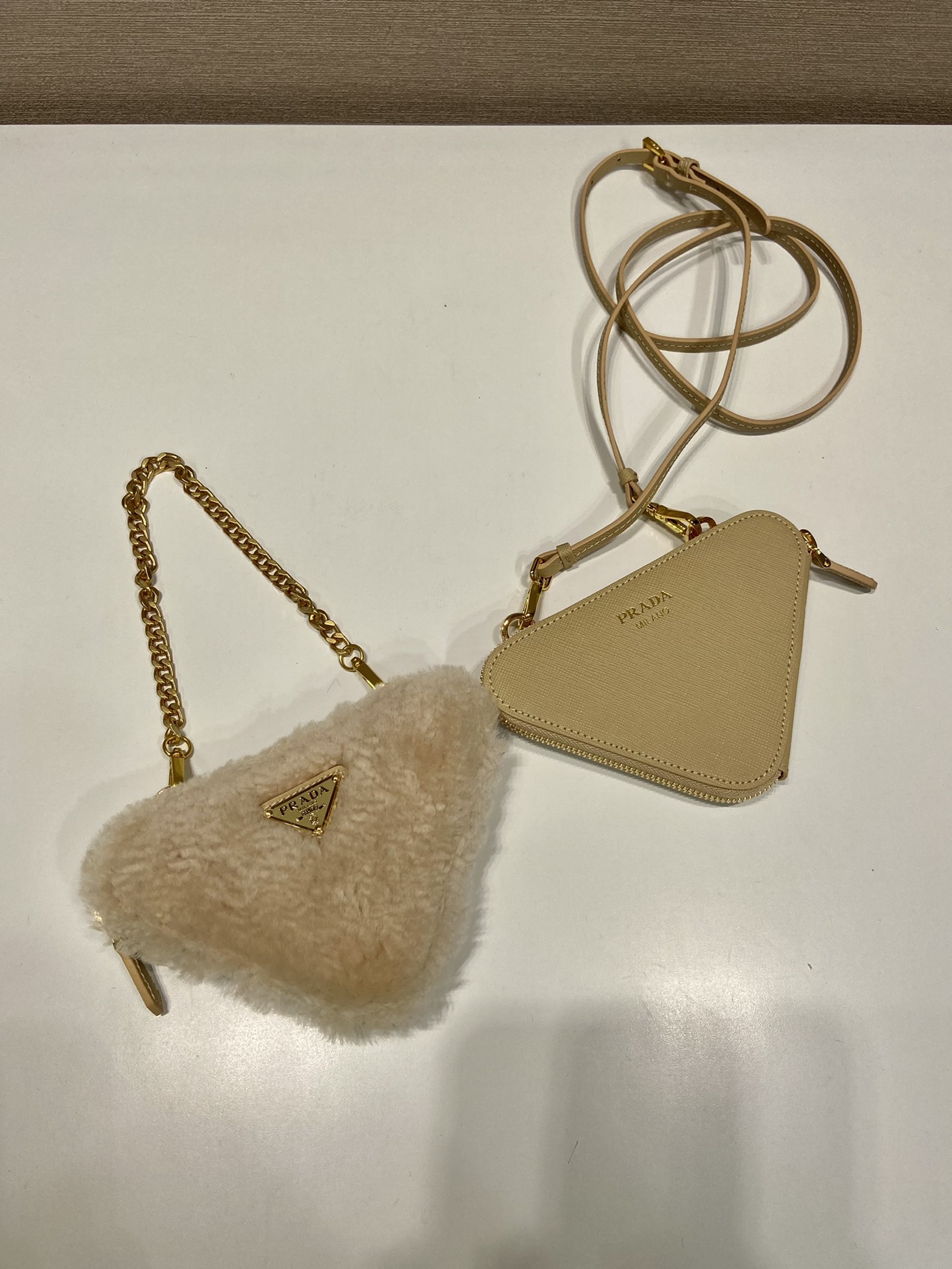 Pra*a shearling and saffiano leather mini-pouch