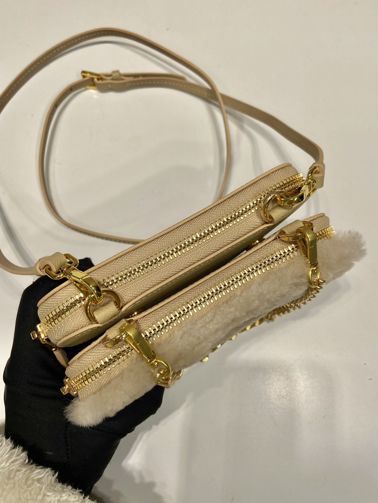 Pra*a shearling and saffiano leather mini-pouch