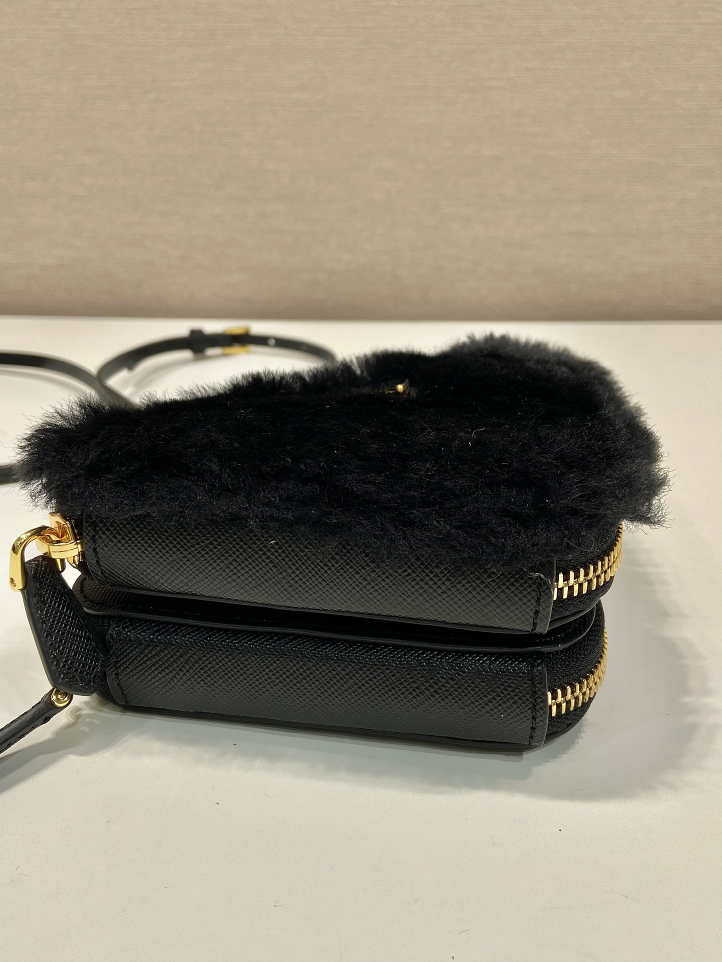 Pra*a shearling and saffiano leather mini-pouch