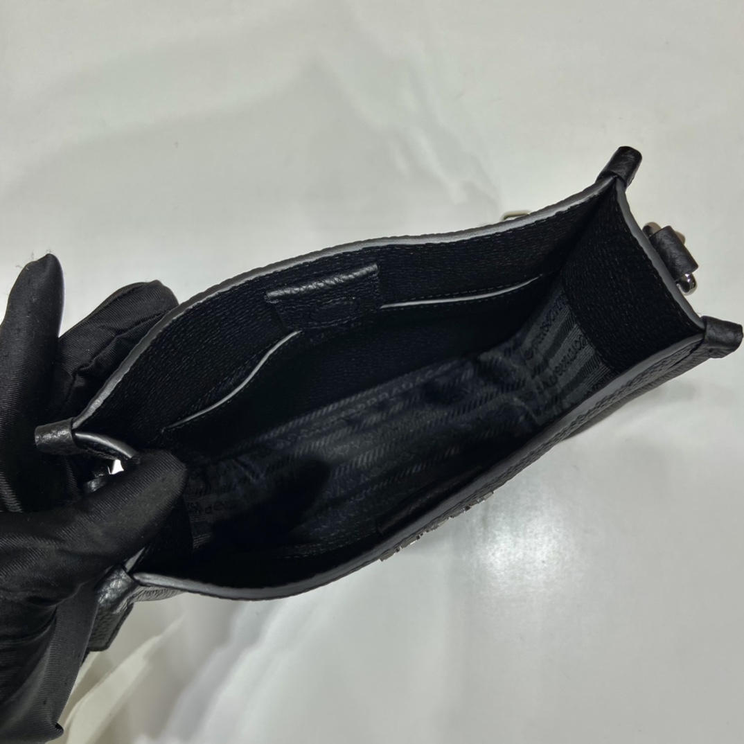 Pra*a leather mini shoulder bag
