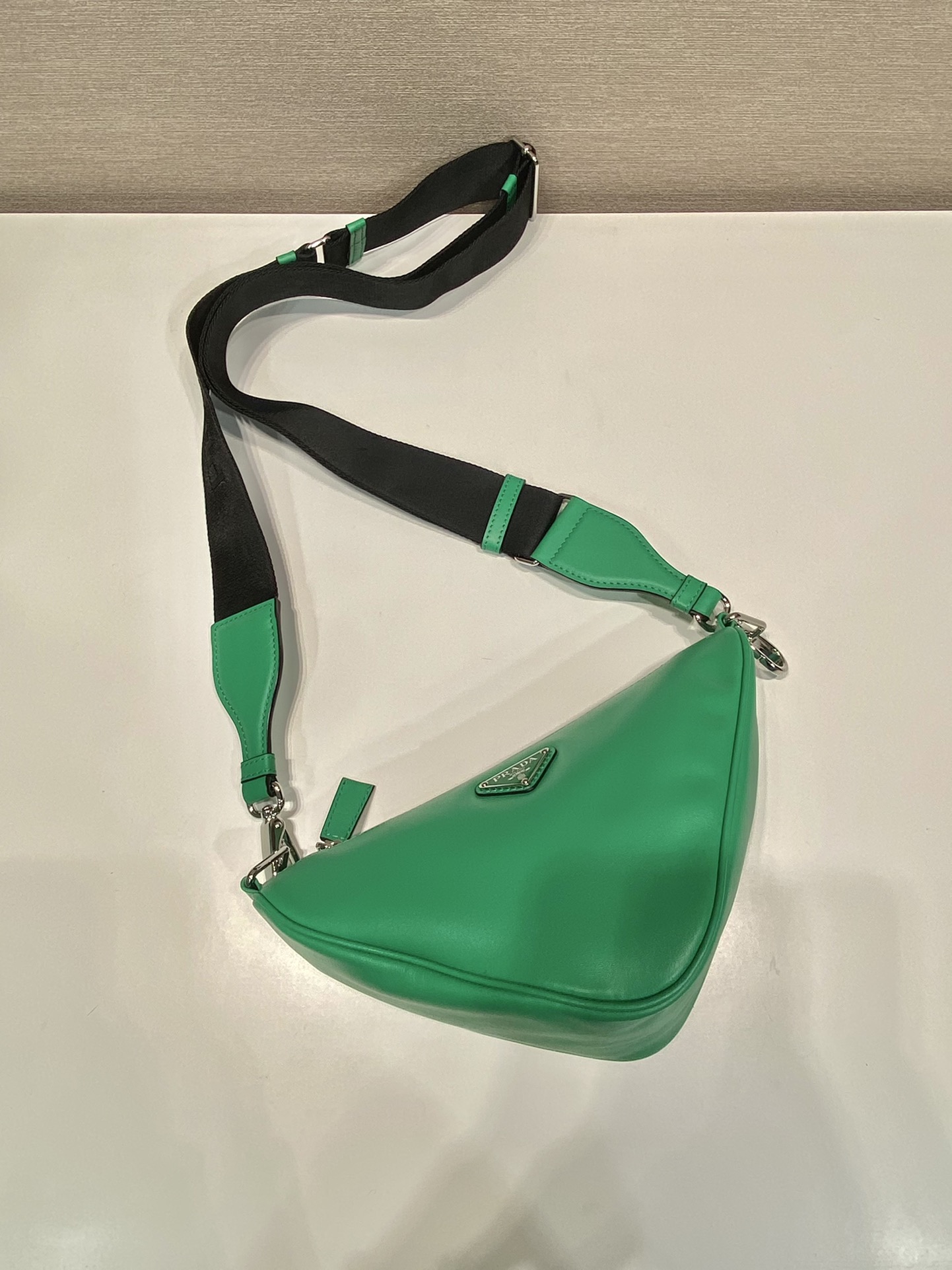 saffiano Pra*a triangle bag