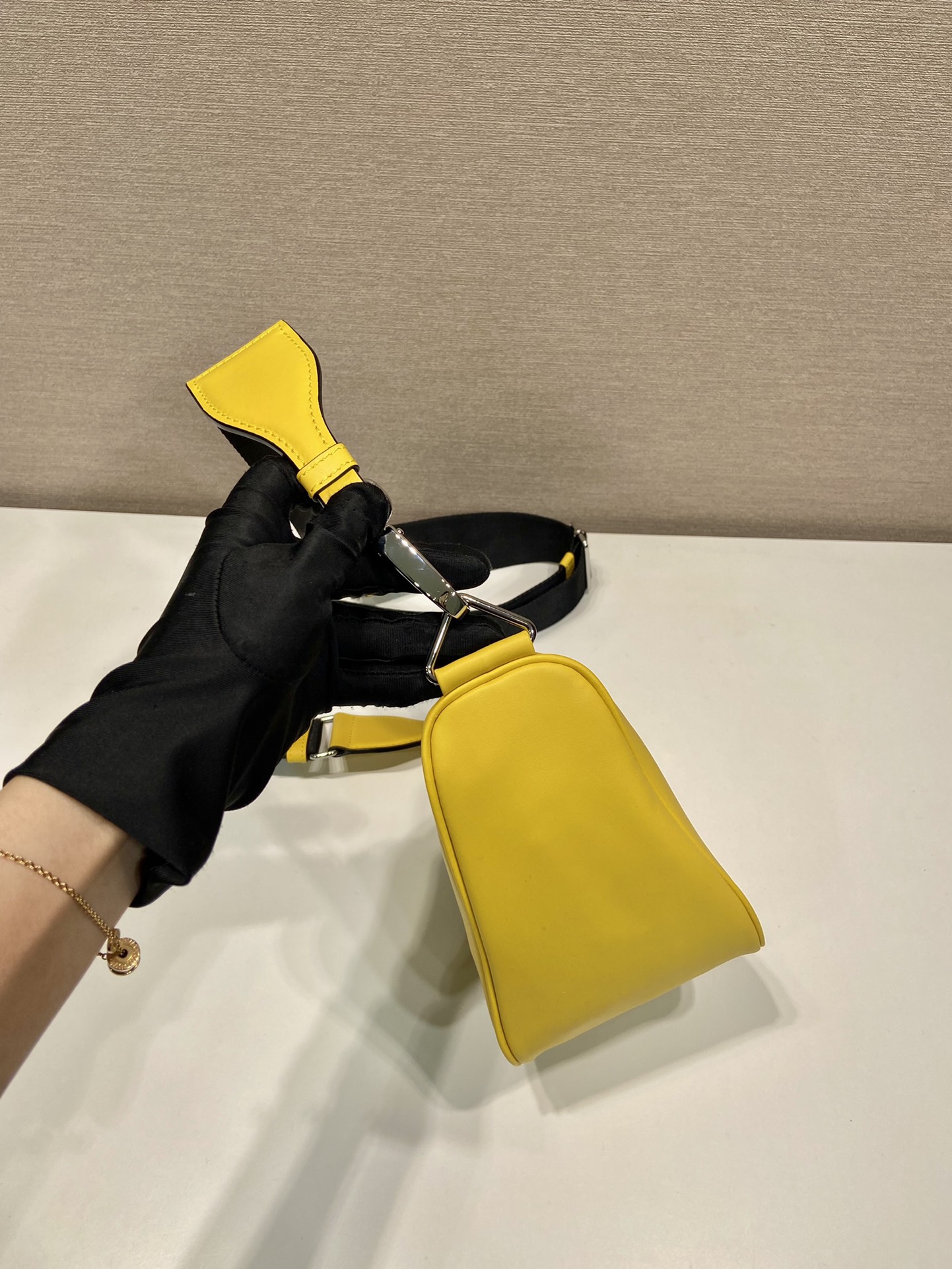 saffiano Pra*a triangle bag