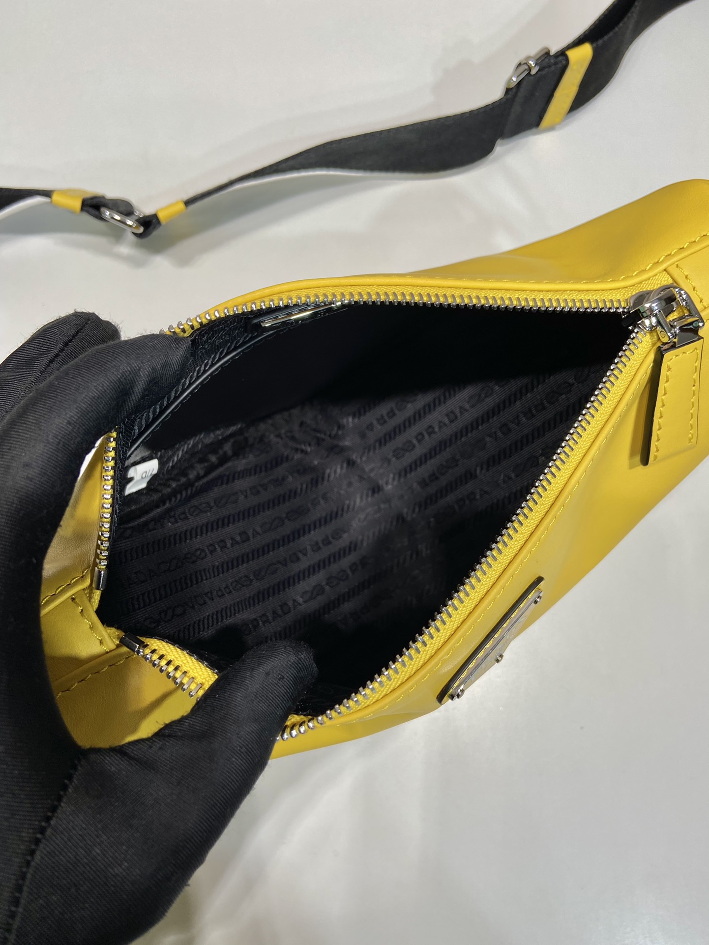 saffiano Pra*a triangle bag