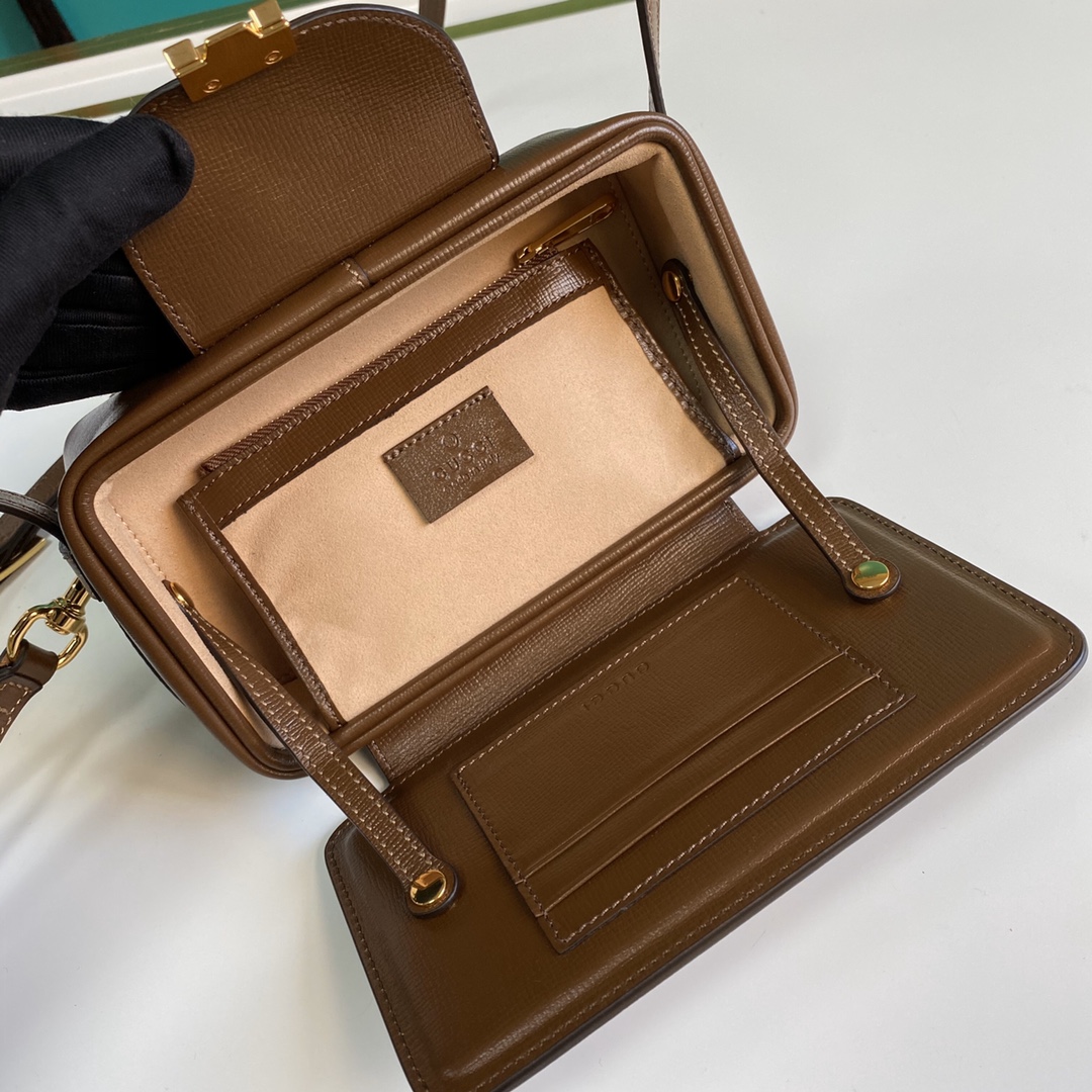 G*u*i gg mini bag with clasp closure
