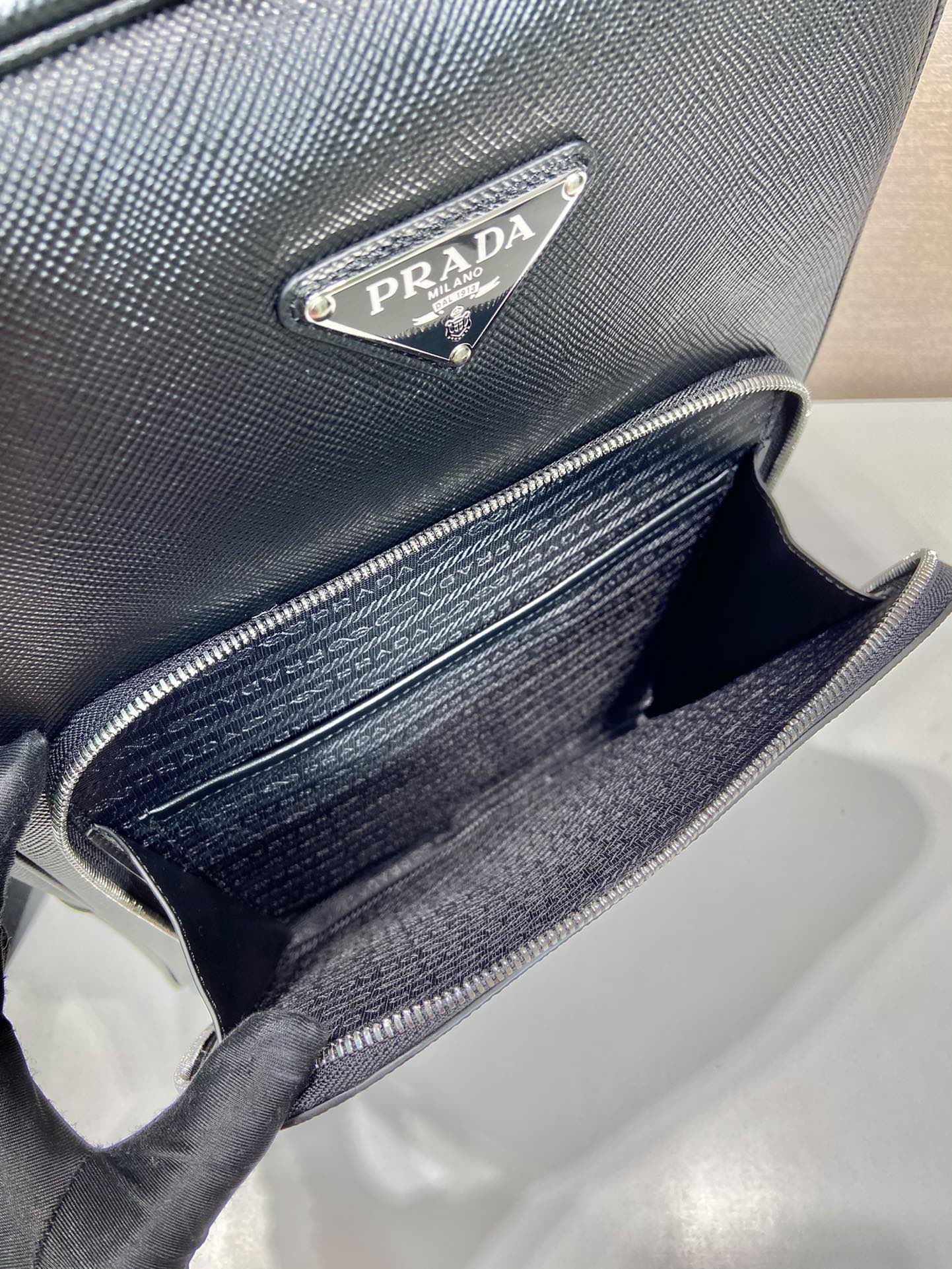 Pra*a saffiano leather backpack