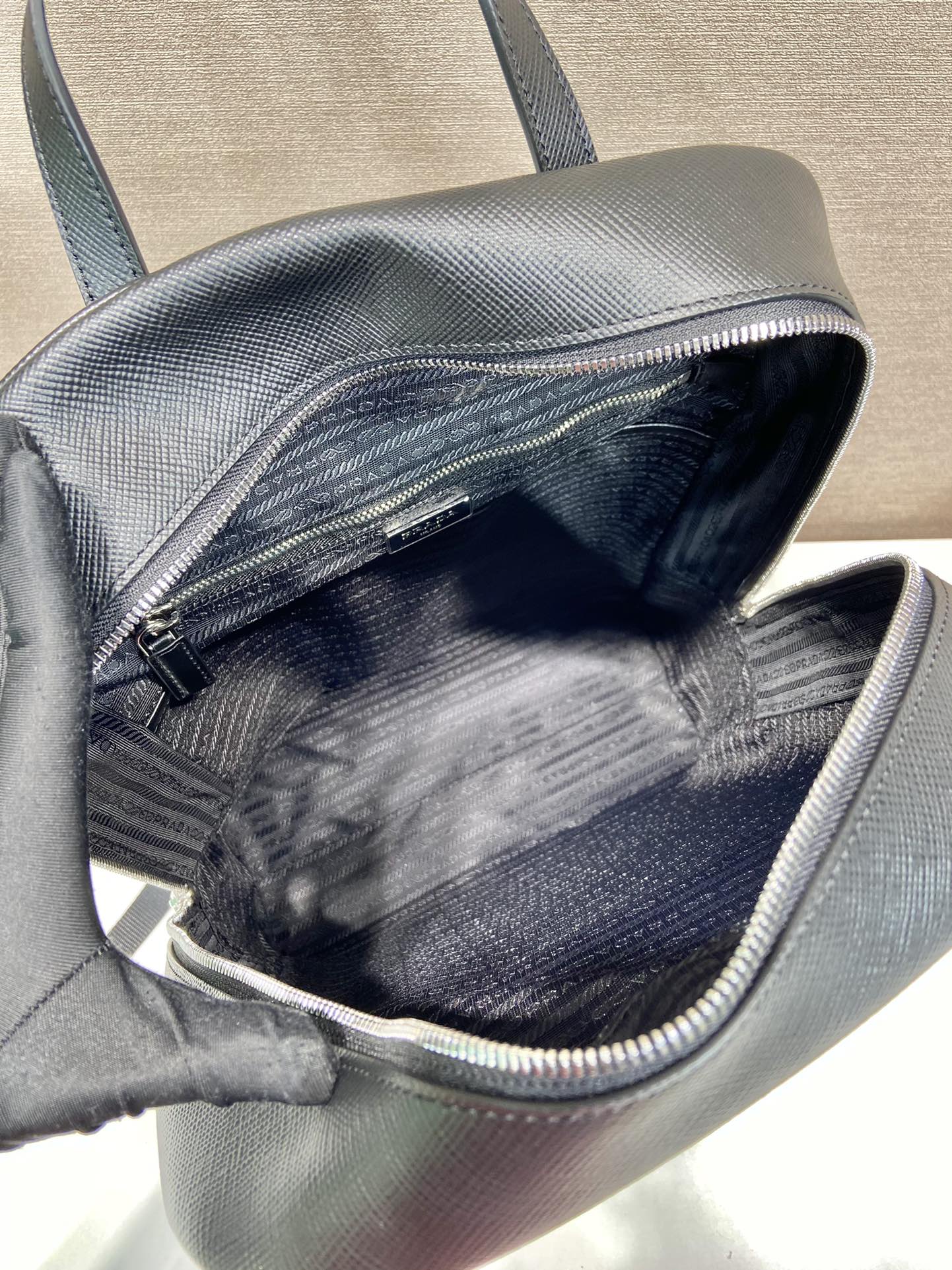 Pra*a saffiano leather backpack