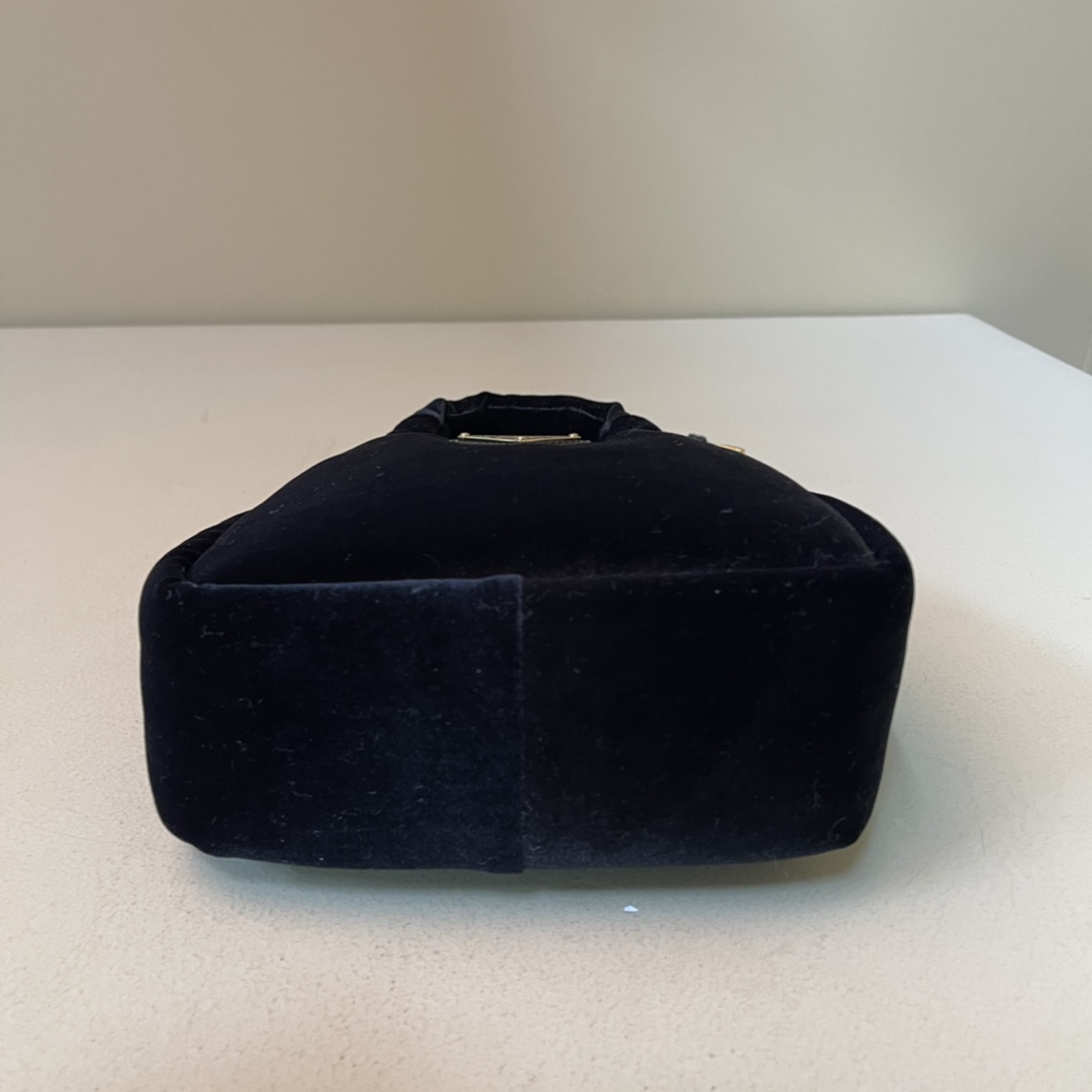 Pra*a padded velvet mini handbag