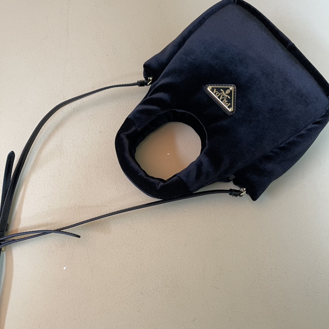 Pra*a padded velvet mini handbag