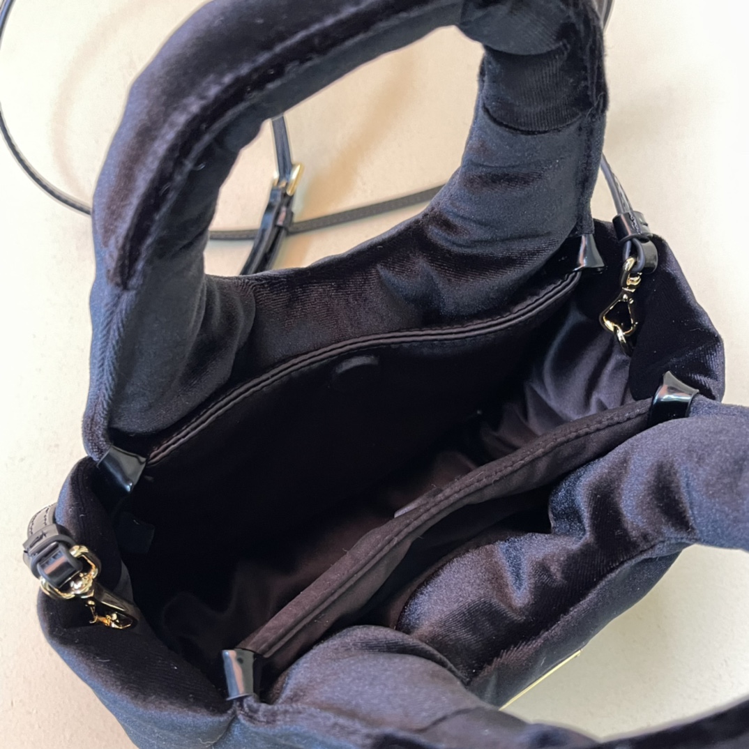 Pra*a padded velvet mini handbag