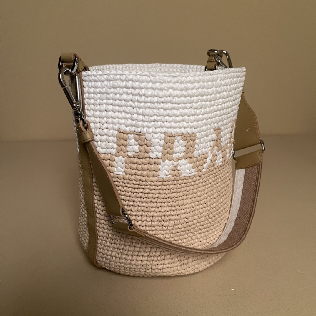 Pra*a crochet and leather mini-bucket bag