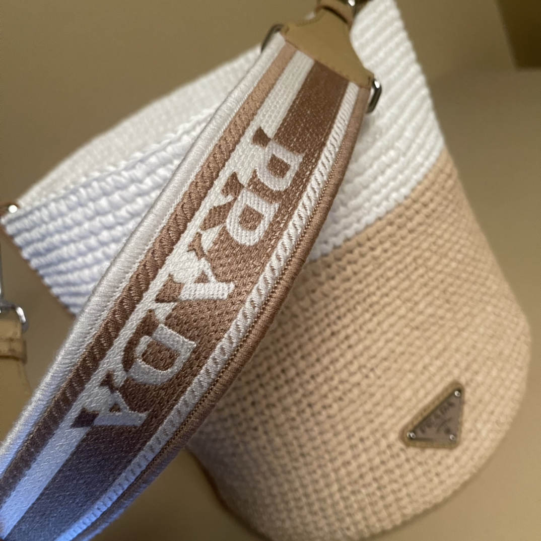 Pra*a crochet and leather mini-bucket bag