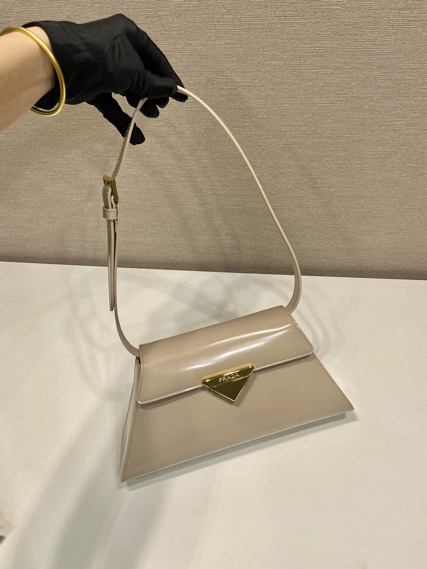 Pra*a medium brushed leather handbag