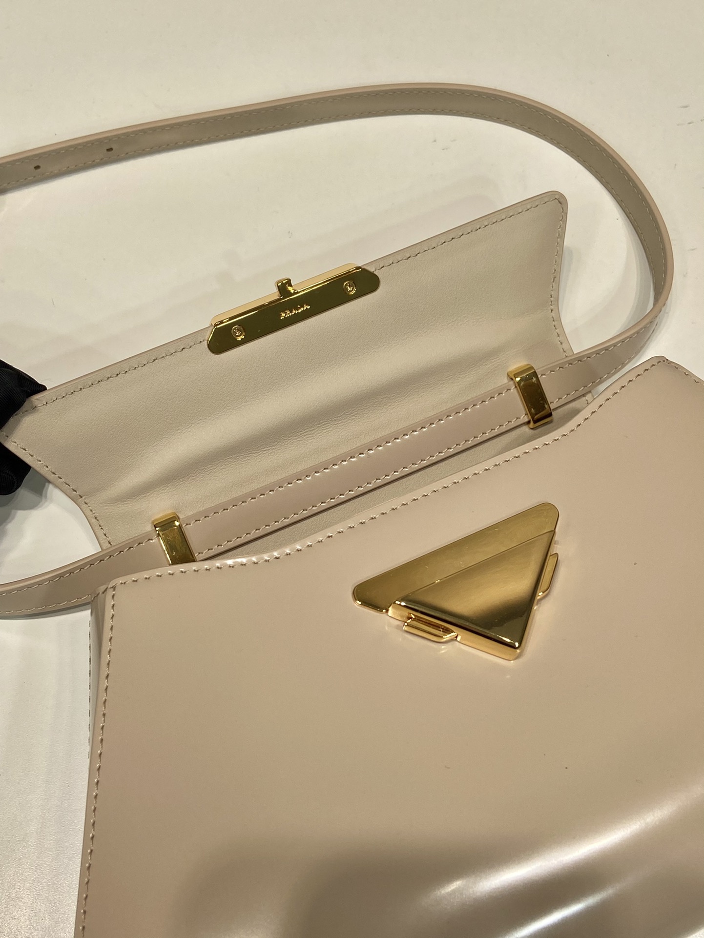 Pra*a medium brushed leather handbag