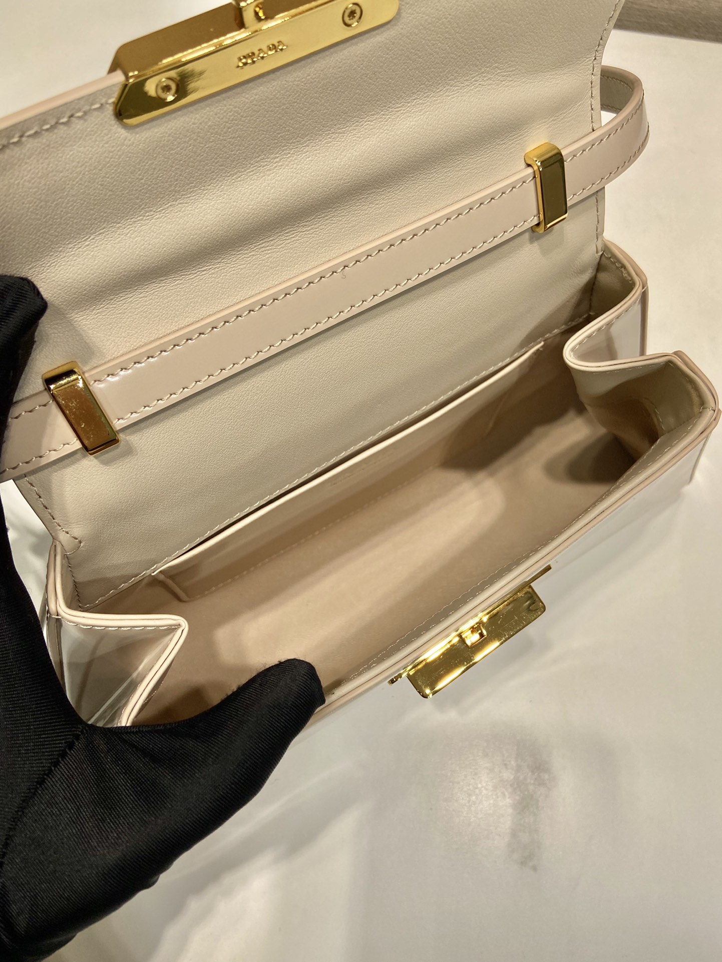 Pra*a medium brushed leather handbag