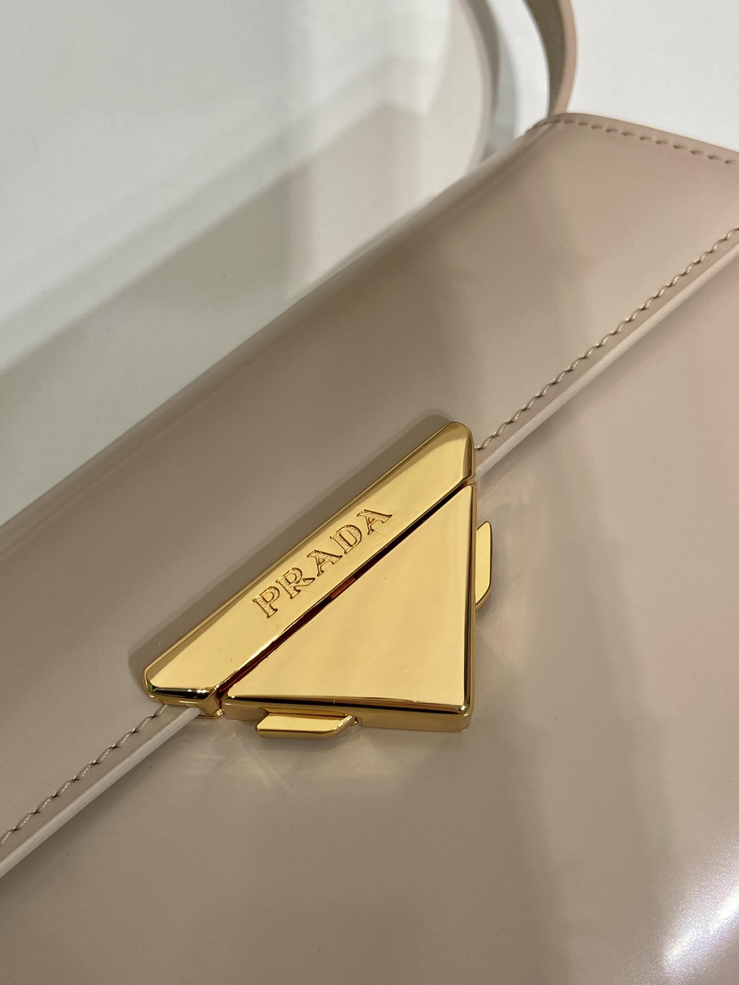 Pra*a medium brushed leather handbag