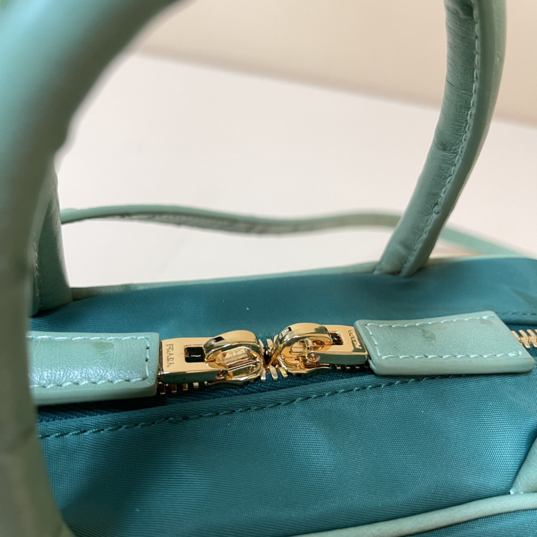 Pra*a re-nylon and leather two-handle bag