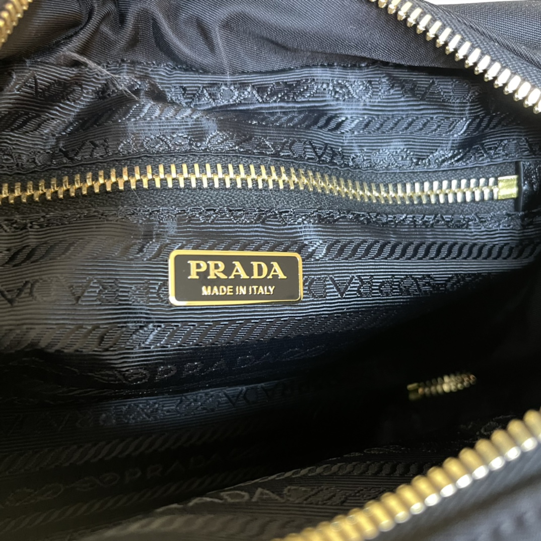 Pra*a re-nylon and leather two-handle bag