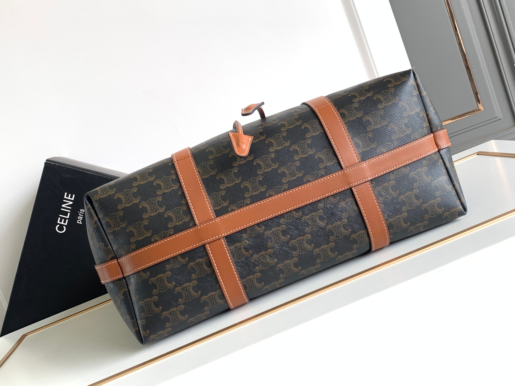 Ce**e cabas drawstring in triomphe canvas and calfskin tan